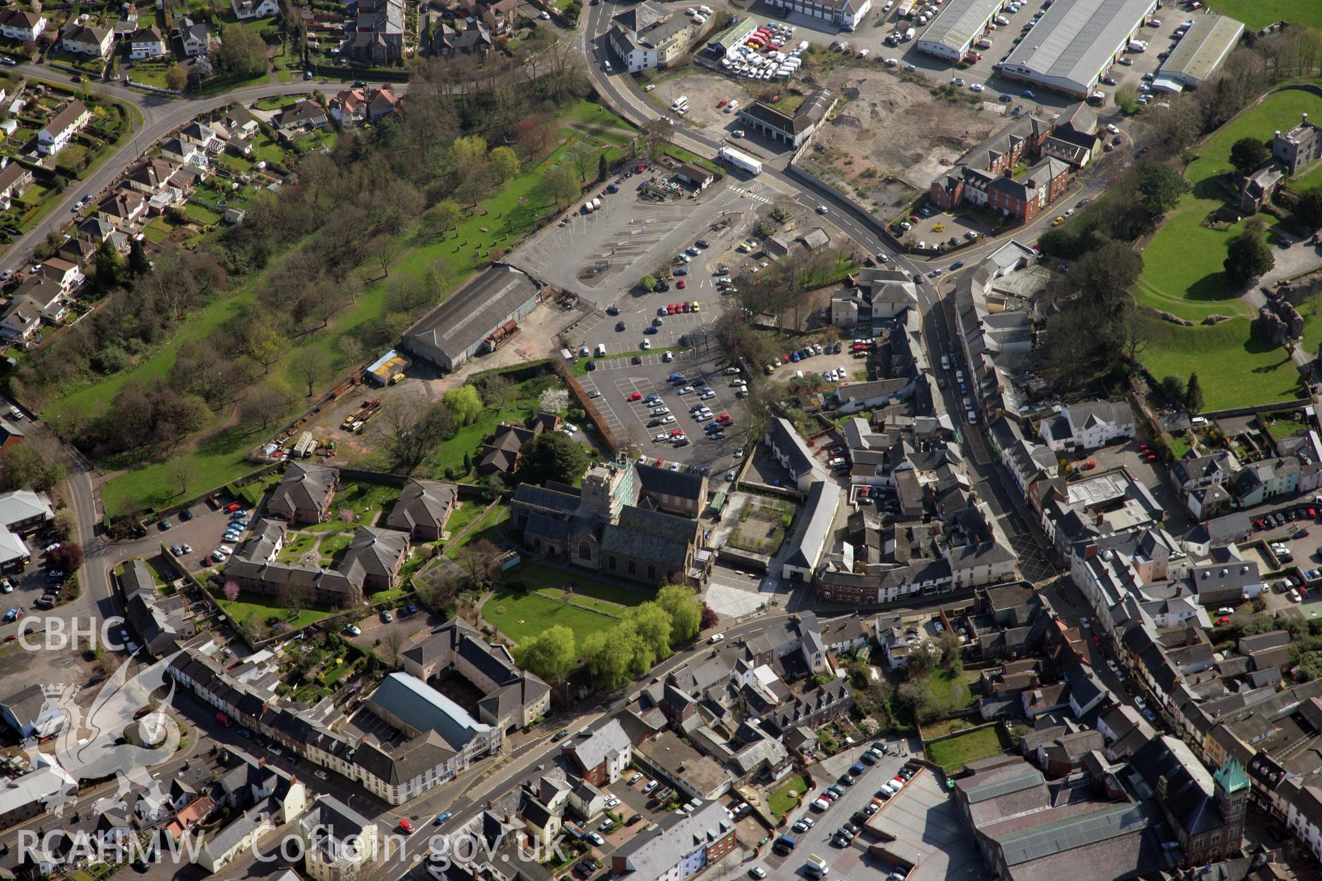 RCAHMW colour oblique photograph of St Mary's Church, Abergavenny. Taken by Toby Driver and Oliver Davies on 28/03/2012.