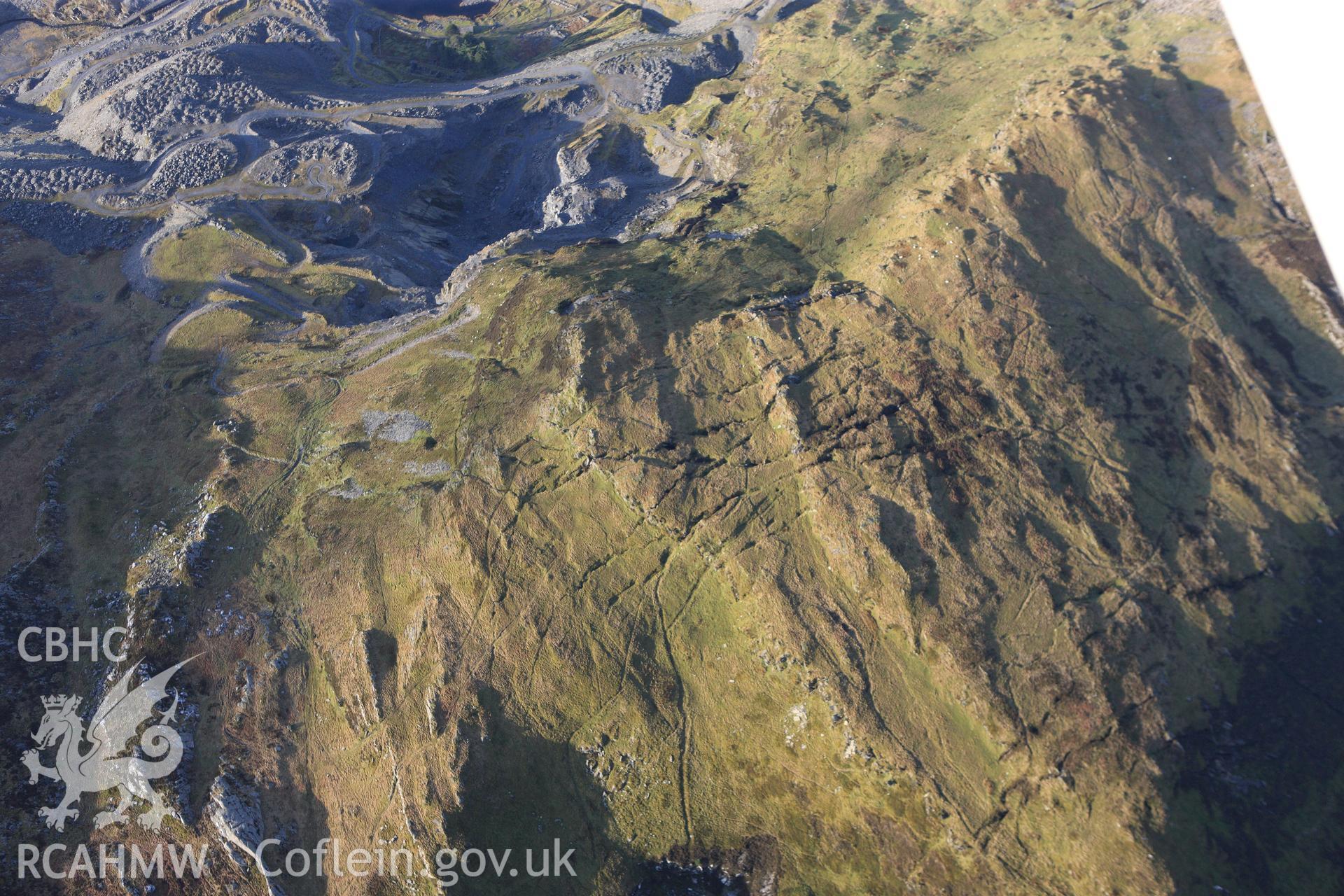 RCAHMW colour oblique photograph of Cwmorthin slate quarry, linear workings to east of quarry. Taken by Toby Driver on 13/01/2012.