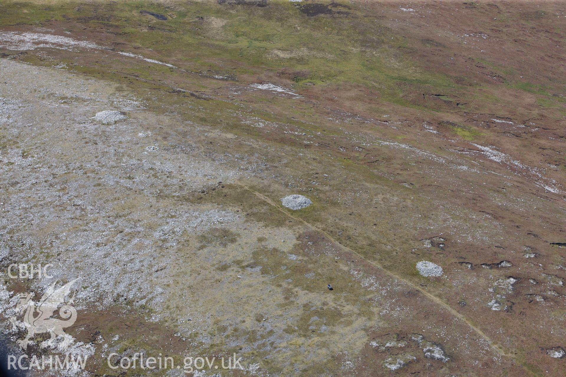 RCAHMW colour oblique photograph of Tair Carn Isaf, landscape from the north-east. Taken by Toby Driver on 22/05/2012.