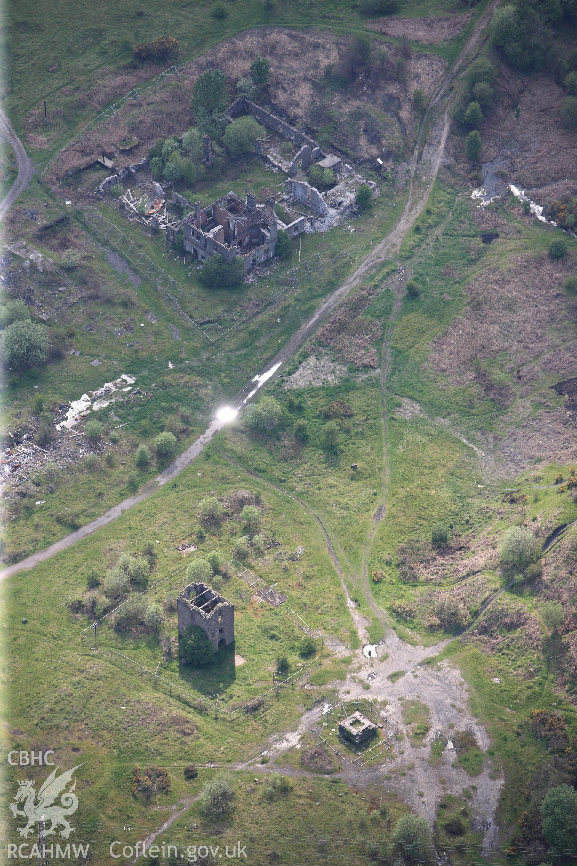 RCAHMW colour oblique photograph of British Ironworks, offices and workshops, with Pumping Engine House. Taken by Toby Driver on 22/05/2012.