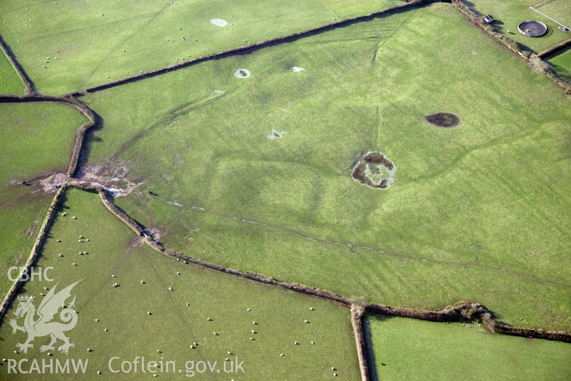 RCAHMW colour oblique photograph of Llanddewi Enclosure. Taken by Toby Driver on 02/02/2012.