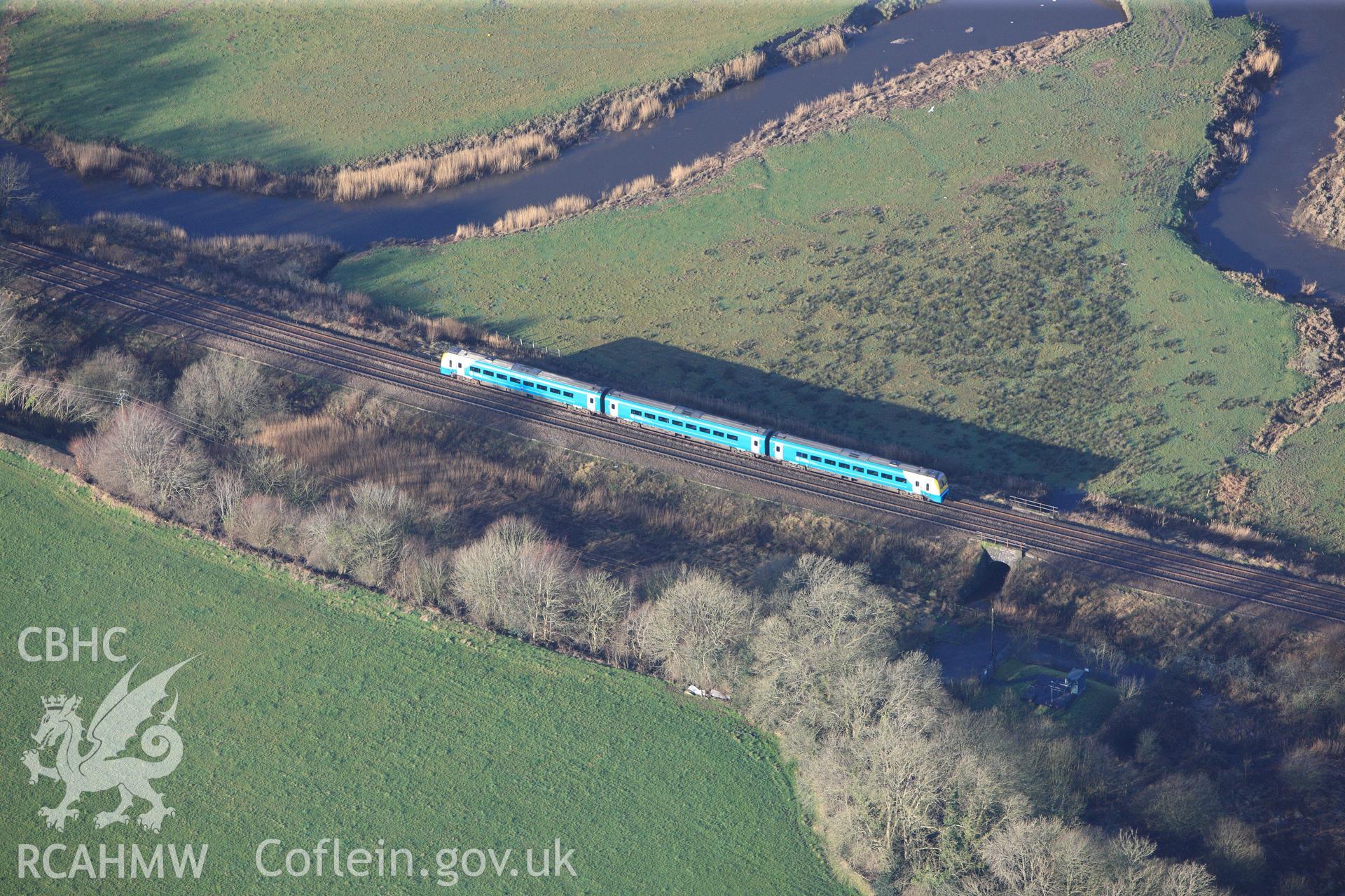 RCAHMW colour oblique photograph of Arriva Train, south of Ysgol Bro Myrddin, Carmarthen. Taken by Toby Driver on 27/01/2012.