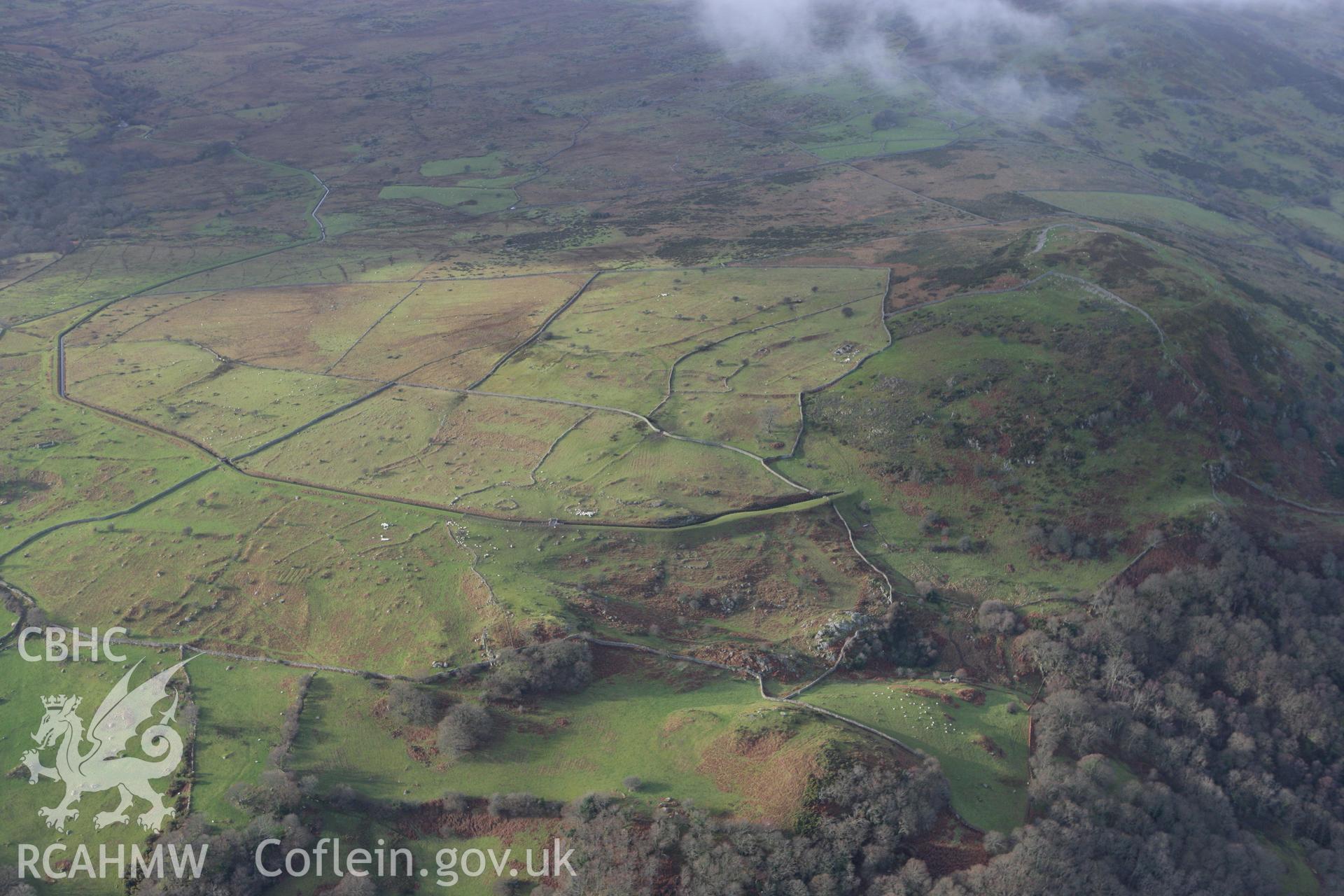 RCAHMW colour oblique photograph of Pen y Gaer hillfort and field systems, view from south. Taken by Toby Driver on 13/01/2012.