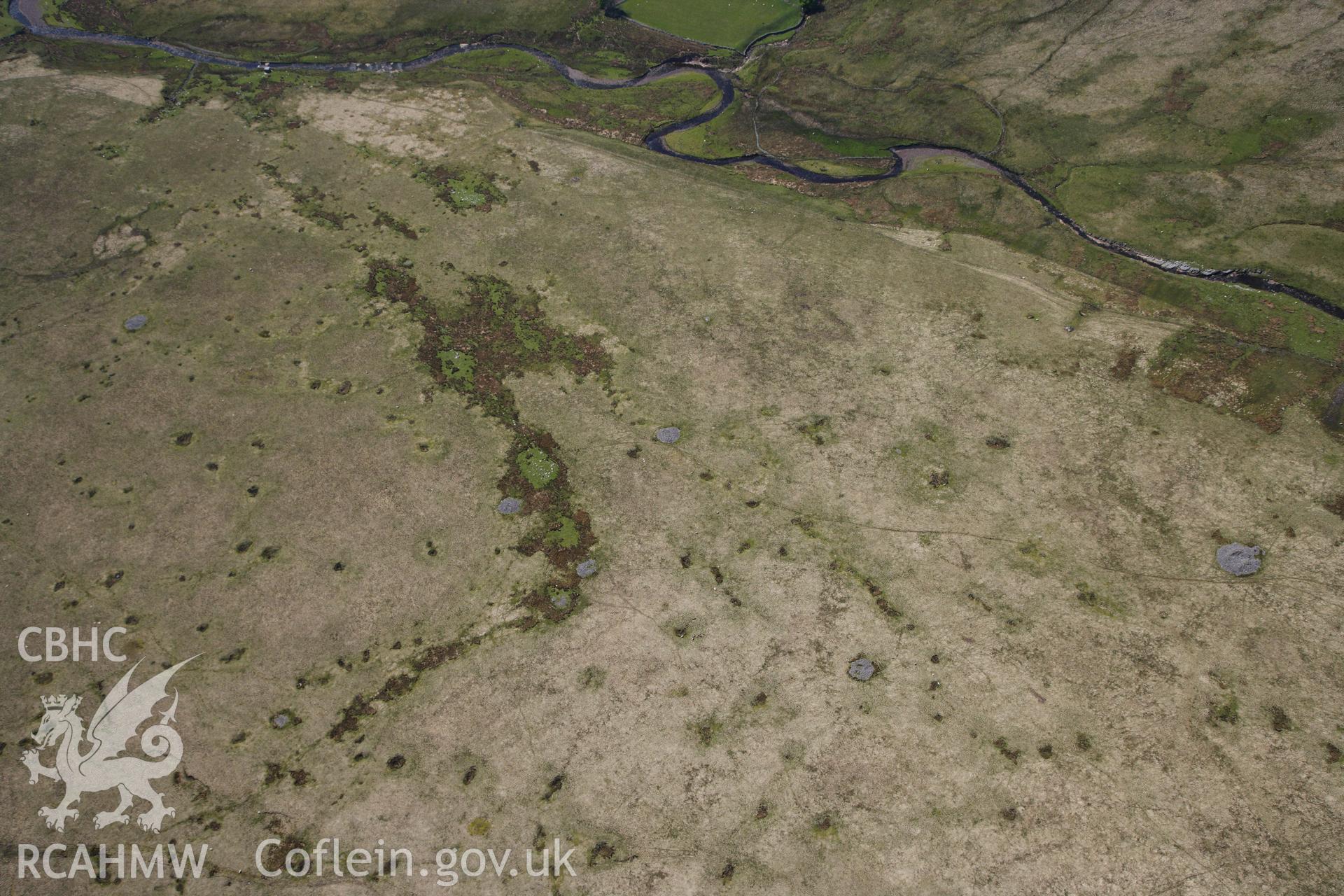 RCAHMW colour oblique photograph of Cefn Esgair-Carnau, cairn field. Taken by Toby Driver on 22/05/2012.