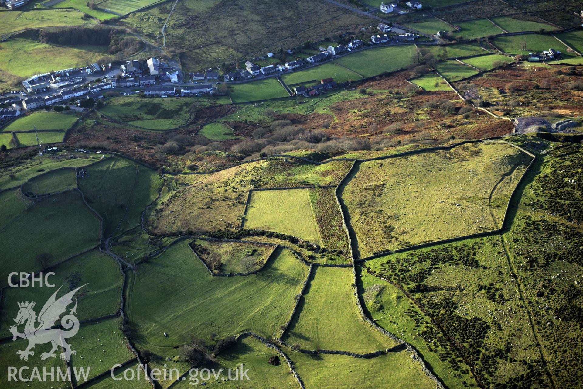 RCAHMW colour oblique photograph of Hut circle settlement at Ffos Coetmor. Taken by Toby Driver on 10/12/2012.