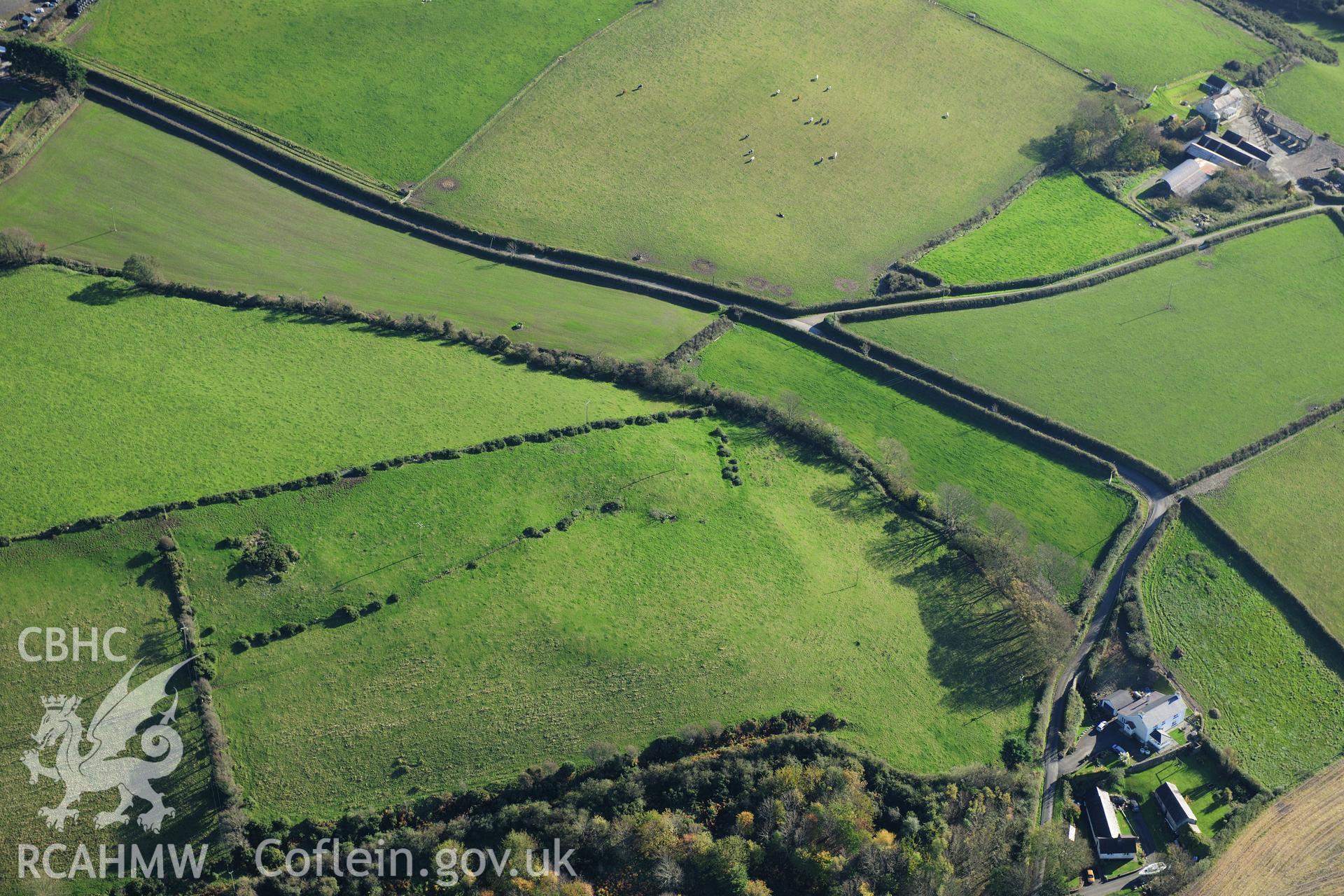 RCAHMW colour oblique photograph of Troed y rhiw defended enclosure. Taken by Toby Driver on 05/11/2012.