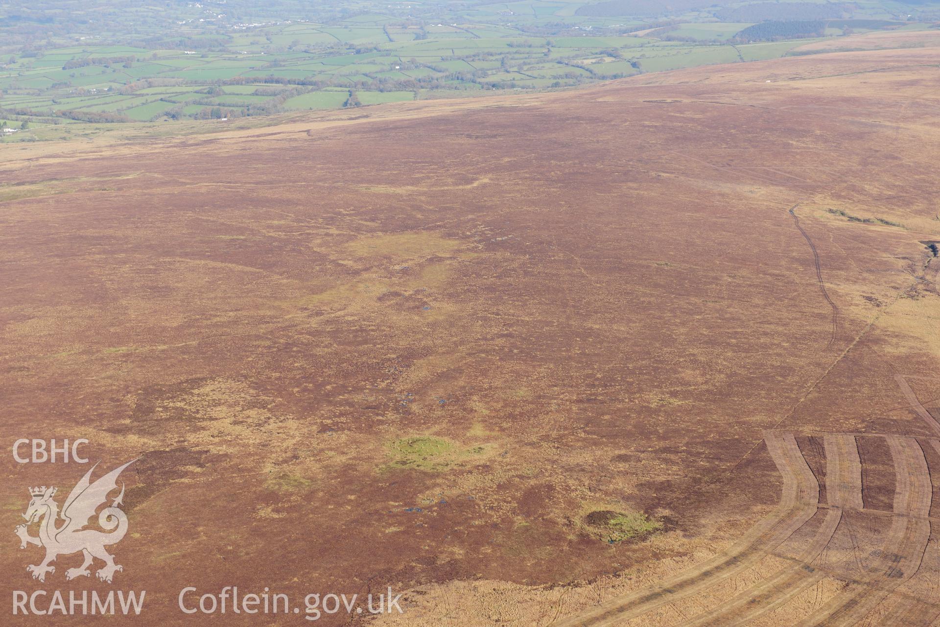 RCAHMW colour oblique photograph of Crugiau Giar, round barrows. Taken by Toby Driver on 05/11/2012.