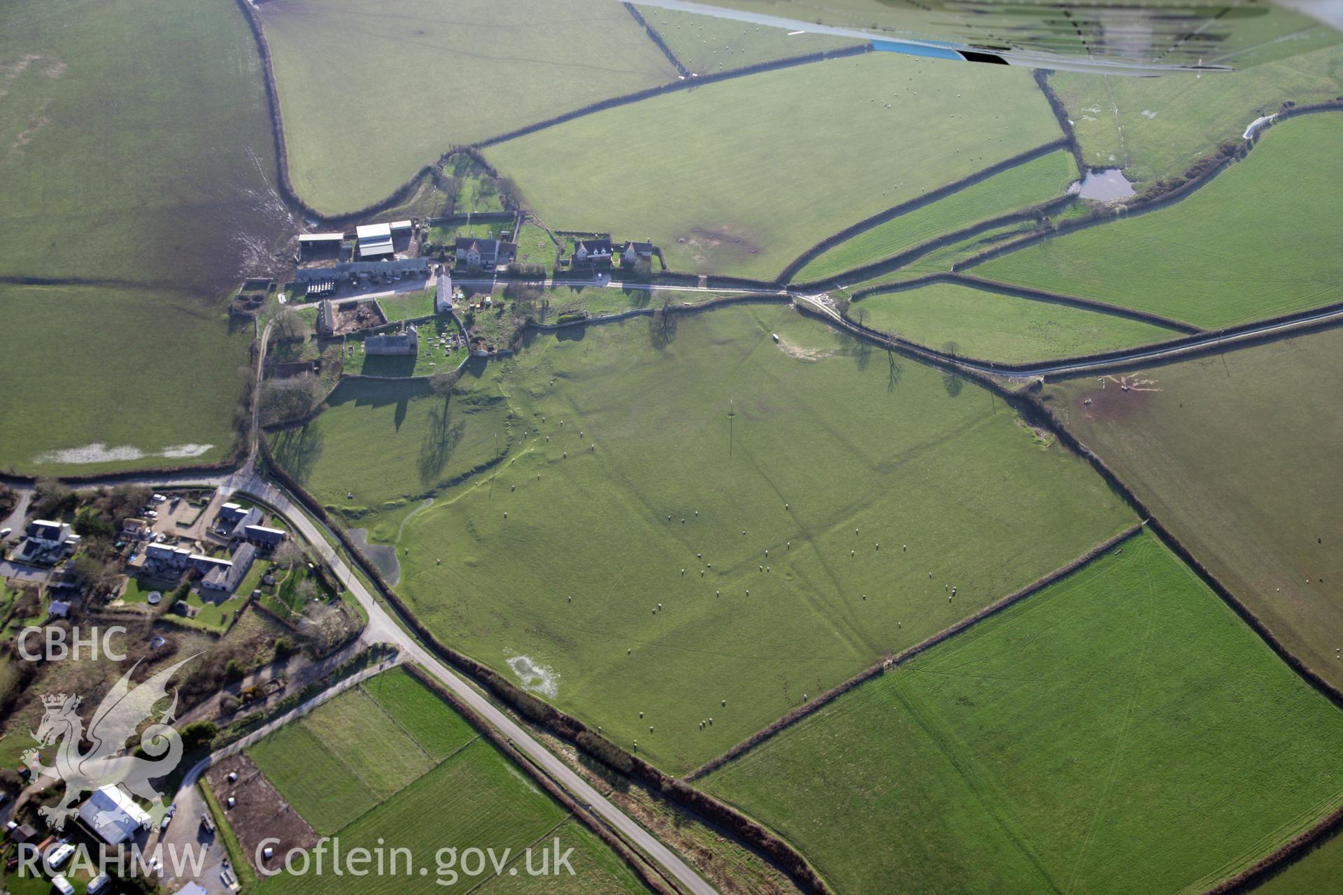 RCAHMW colour oblique photograph of Llanddewi Earthworks. Taken by Toby Driver on 02/02/2012.