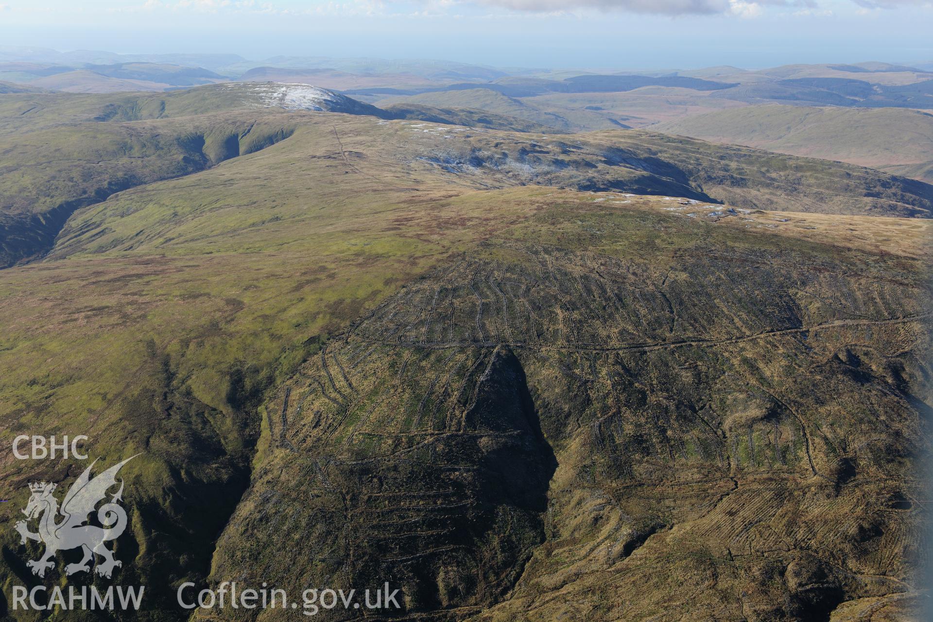 RCAHMW colour oblique photograph of Nant-yr-Eira mine, slopes above mine, view from east. Taken by Toby Driver on 05/11/2012.