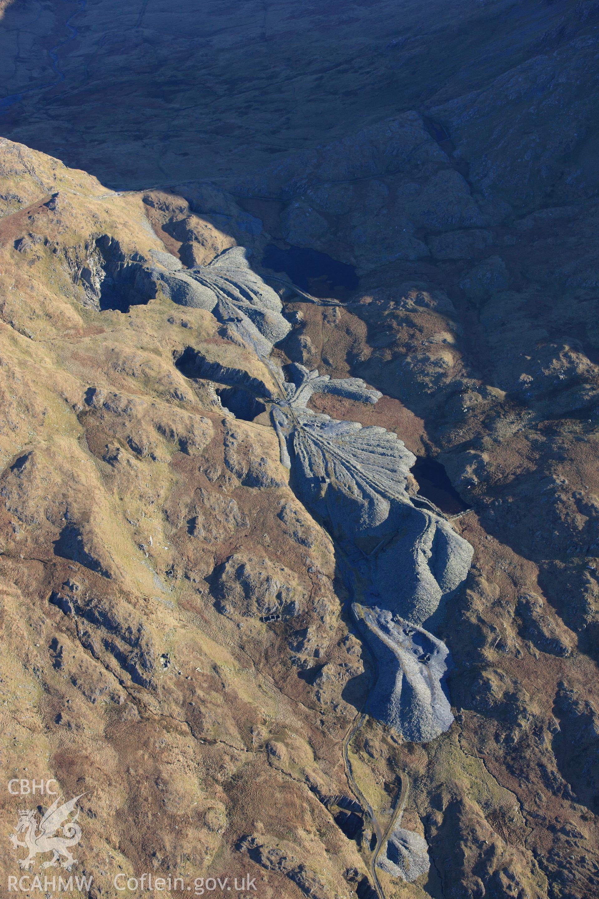 RCAHMW colour oblique photograph of Bwlch Cwmllan slate quarry, in low winter light. Taken by Toby Driver on 10/12/2012.