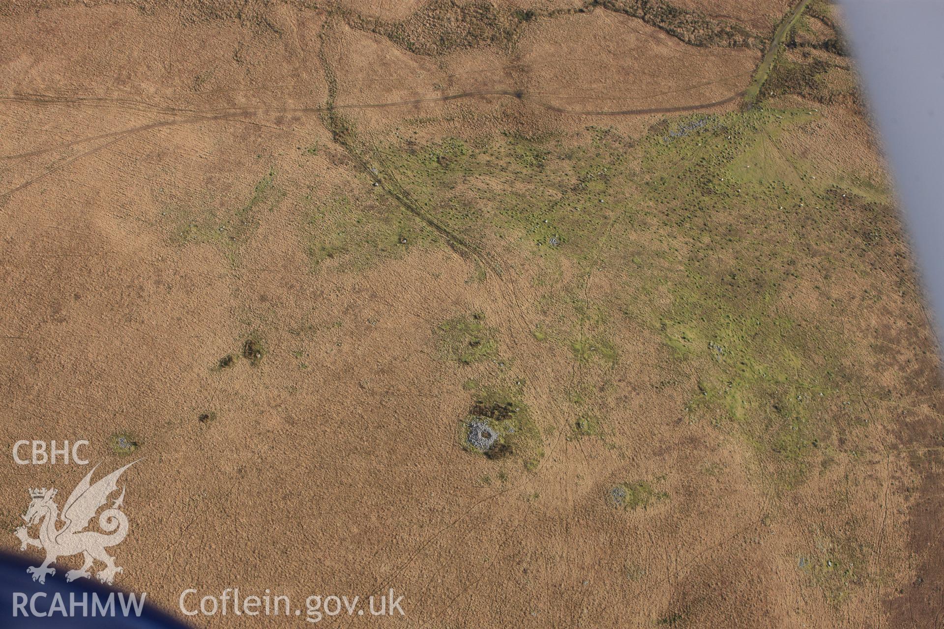 RCAHMW colour oblique photograph of Henrhyd Cairns. Taken by Toby Driver on 28/11/2012.