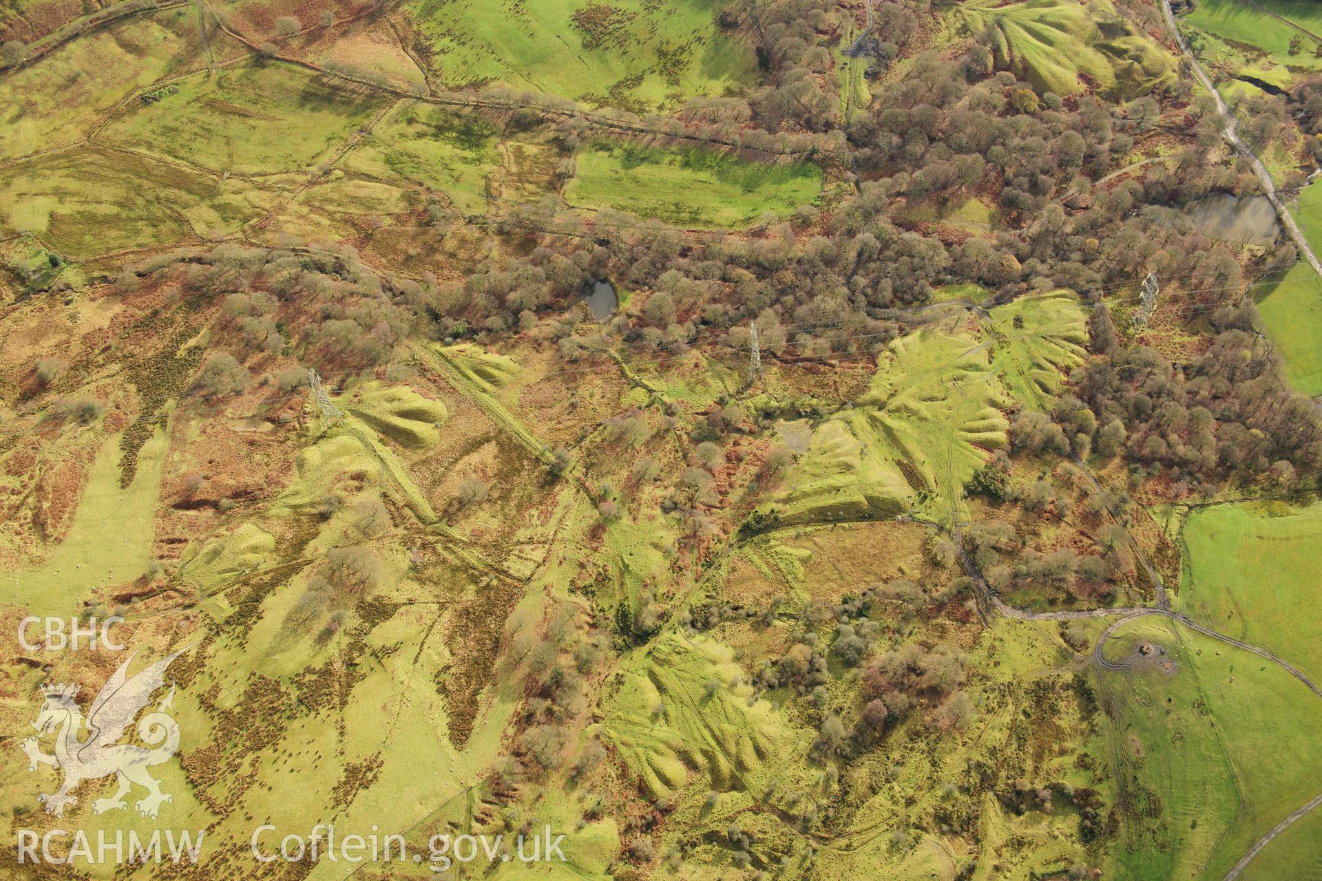 RCAHMW colour oblique photograph of Ironstone levels east of Plymouth Ironworks, industrial landscape. Taken by Toby Driver on 28/11/2012.