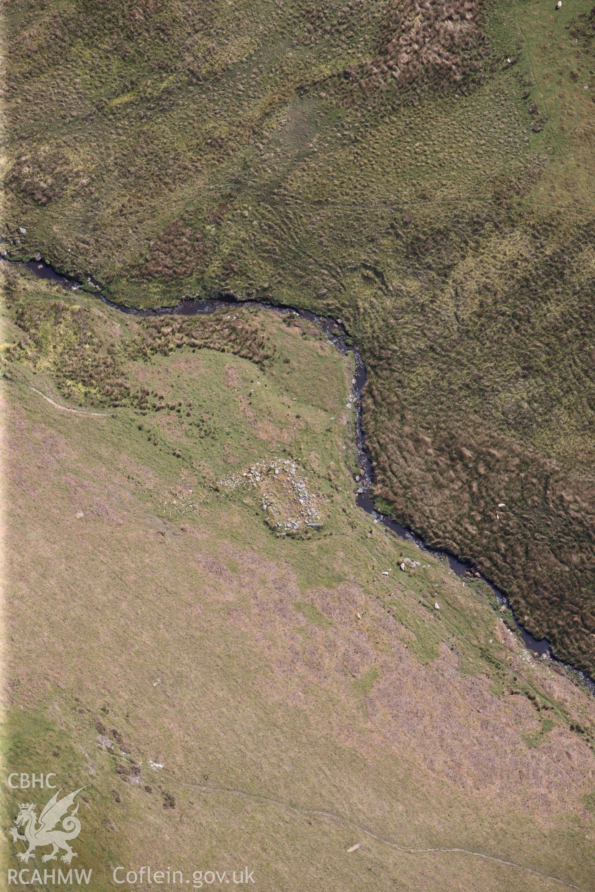 RCAHMW colour oblique photograph of Hafotau Settlement Bryn Melys. Taken by Toby Driver on 28/05/2012.