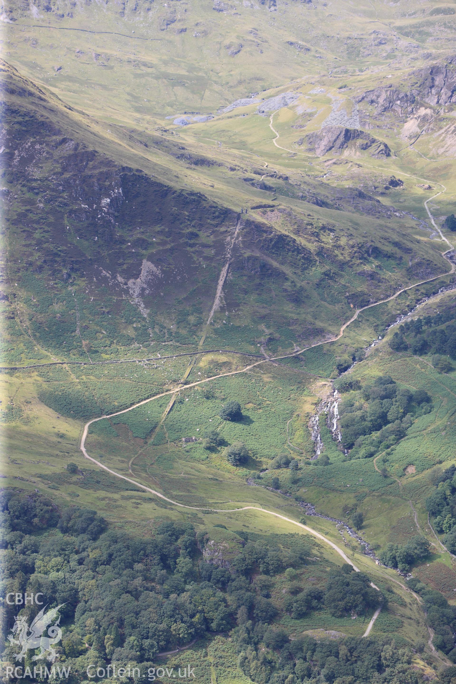 RCAHMW colour oblique photograph of Hafod-y-llan Uchaf, lanscape view from the south-east. Showing dismantled tramway and Watkin Path. Taken by Toby Driver on 10/08/2012.