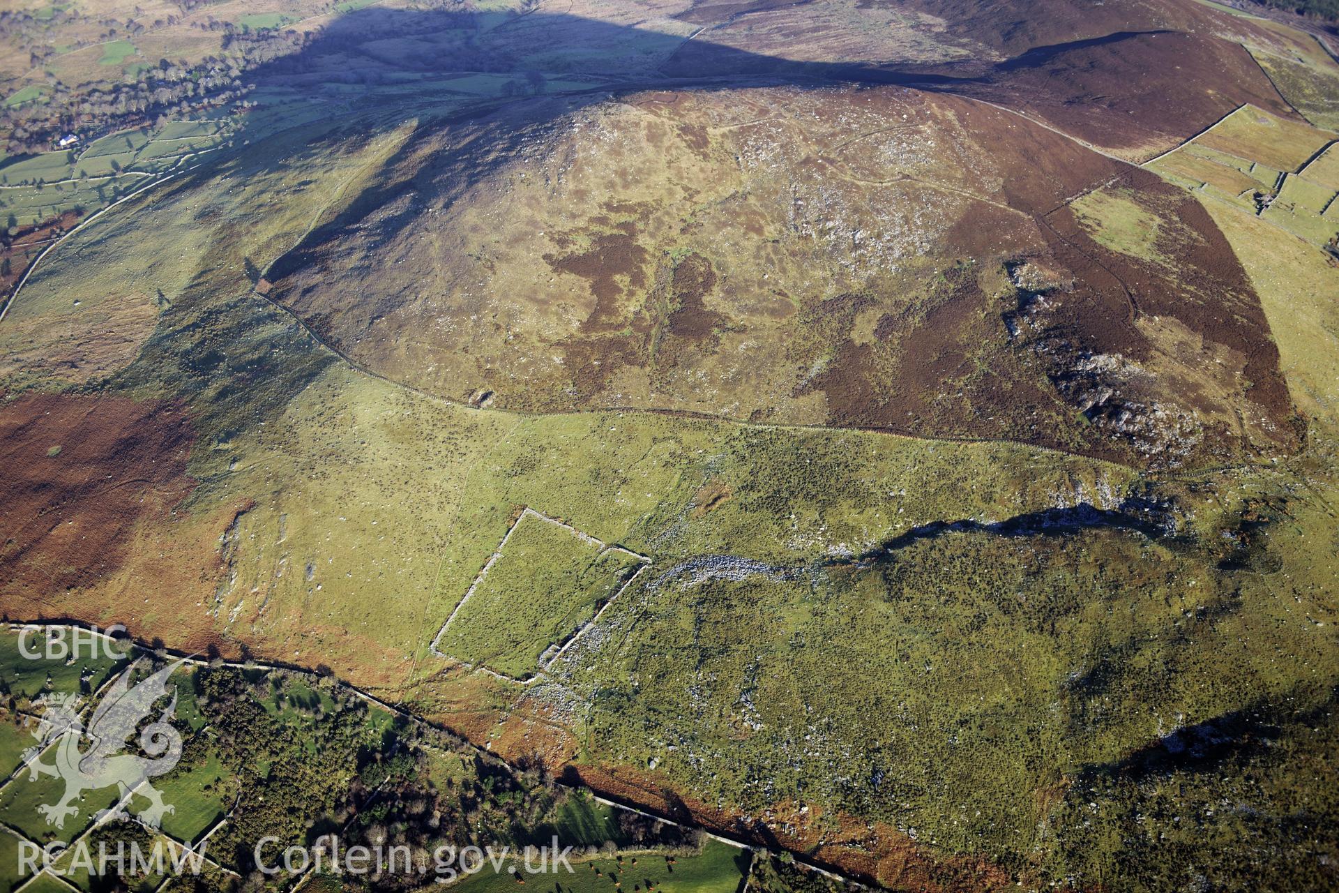 RCAHMW colour oblique photograph of Moel Rhiwen landscape, with Caecerig hut group. Taken by Toby Driver on 10/12/2012.