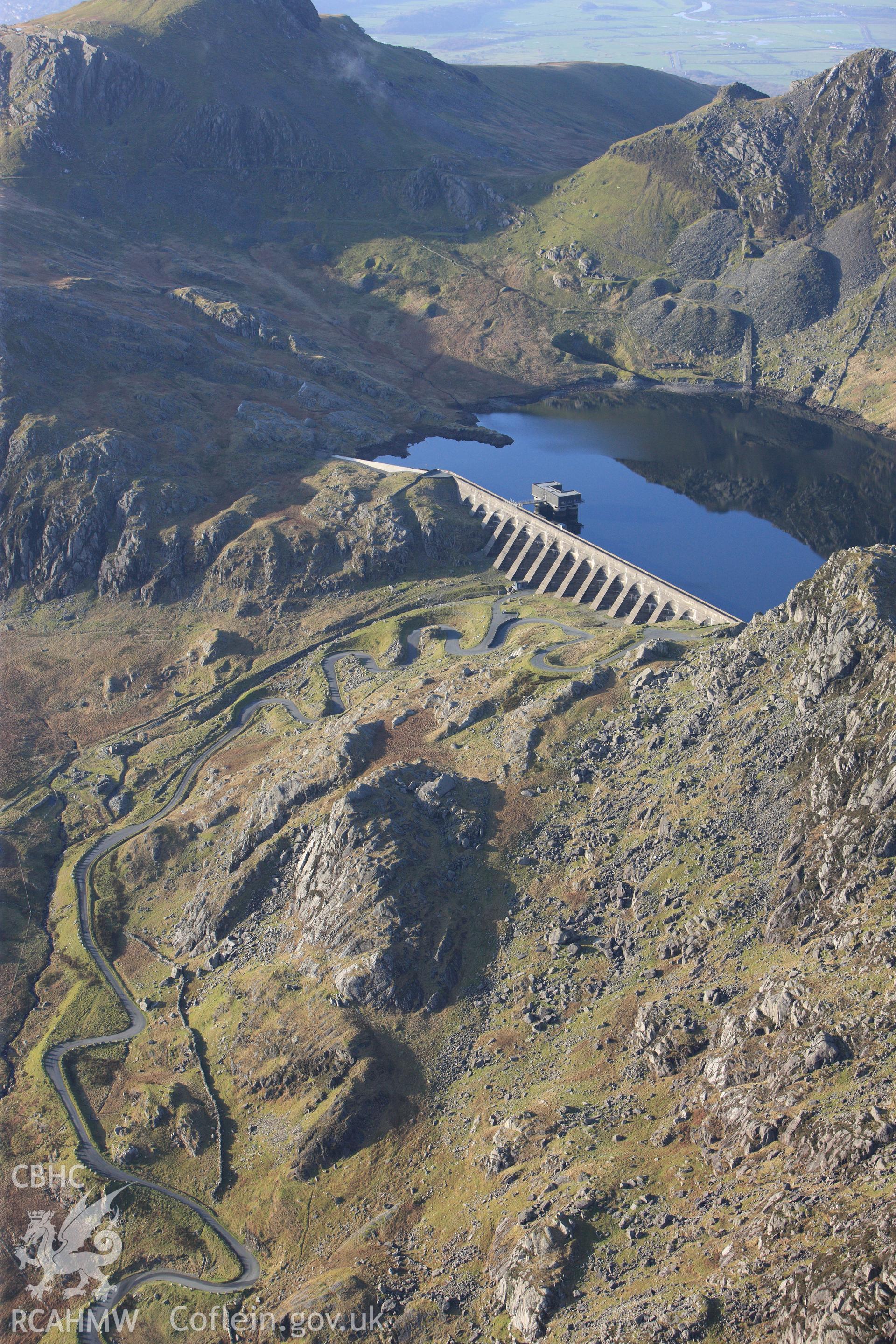 RCAHMW colour oblique photograph of Llyn Stwlan reservoir, with Moelwyn slate quarry. Taken by Toby Driver on 13/01/2012.