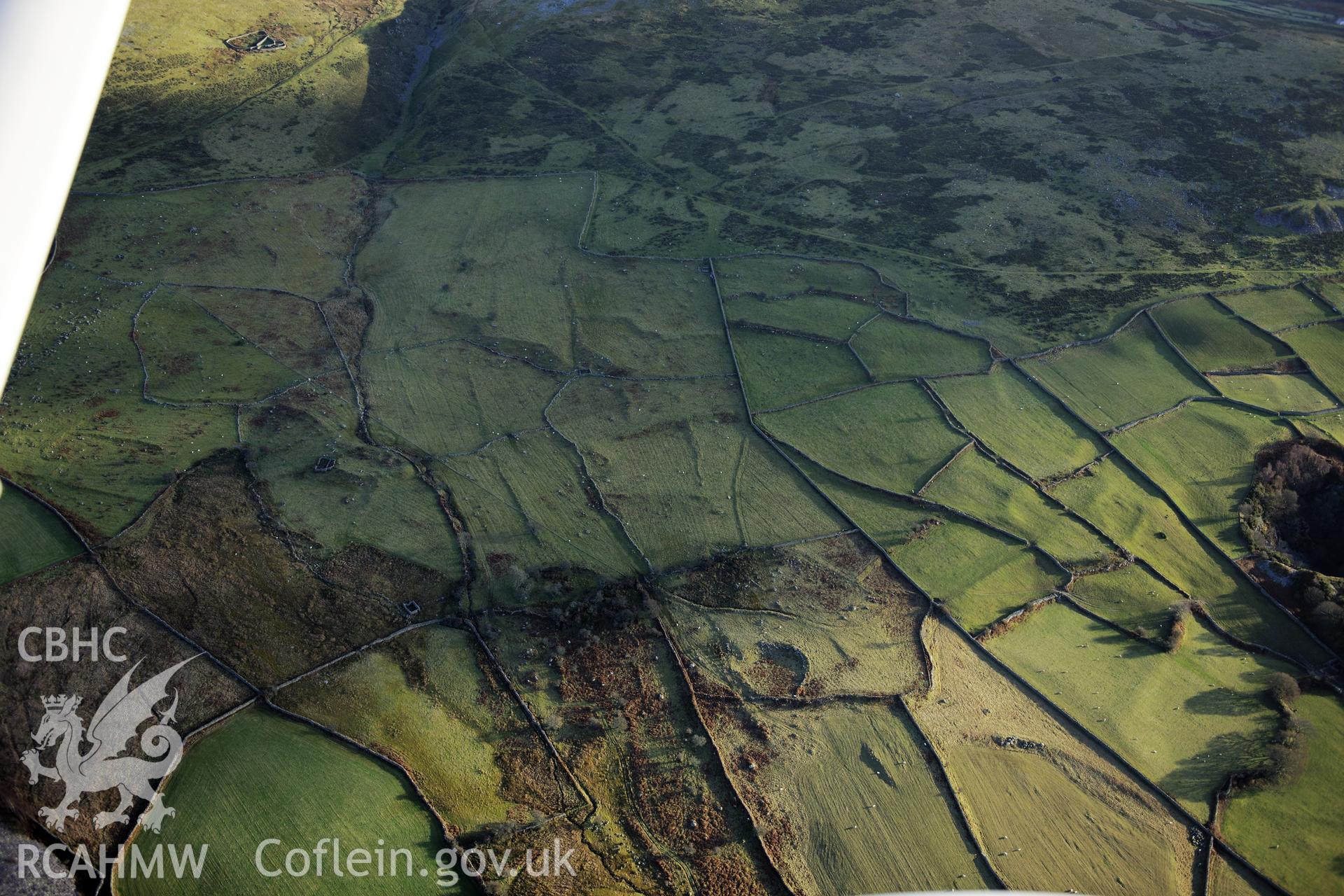 RCAHMW colour oblique photograph of Moel Faban early agricultural landscape, Llanllechid. Taken by Toby Driver on 10/12/2012.