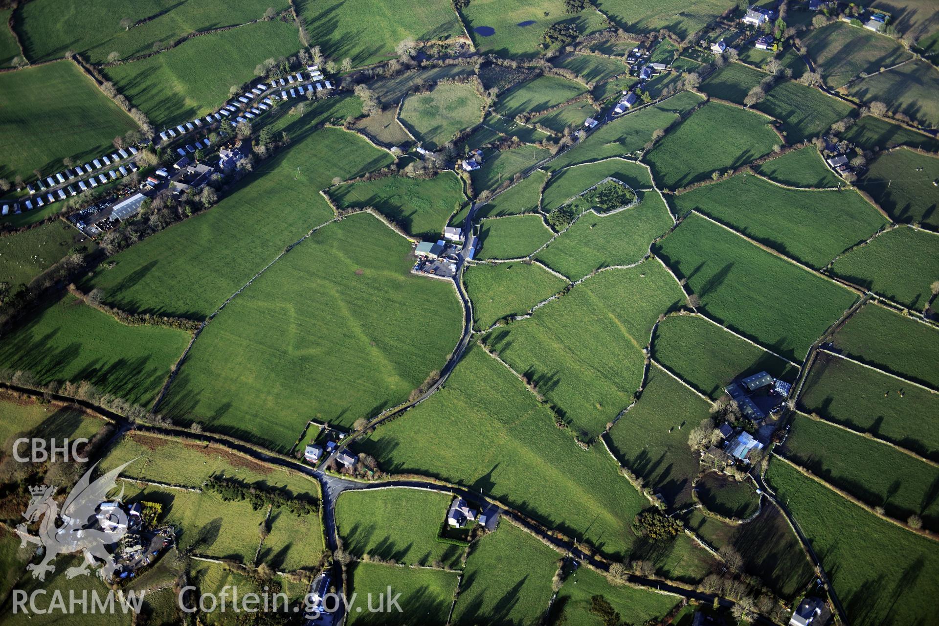 RCAHMW colour oblique photograph of Pen y Gaer settlements and field systems, Glascoed. Taken by Toby Driver on 10/12/2012.