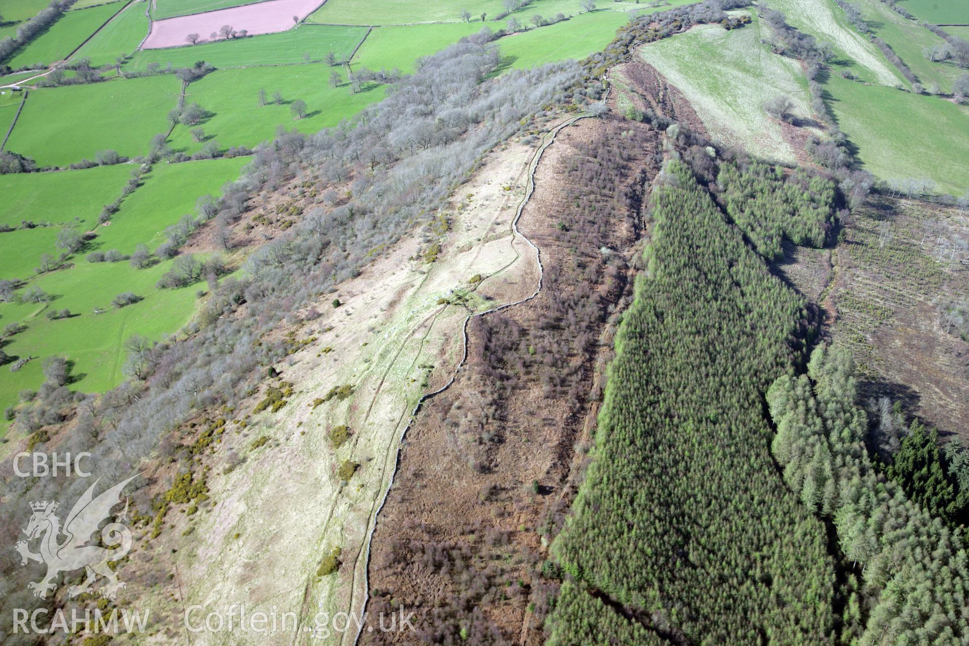 RCAHMW colour oblique photograph of Allt yr Esgair Hillfort. Taken by Toby Driver and Oliver Davies on 28/03/2012.