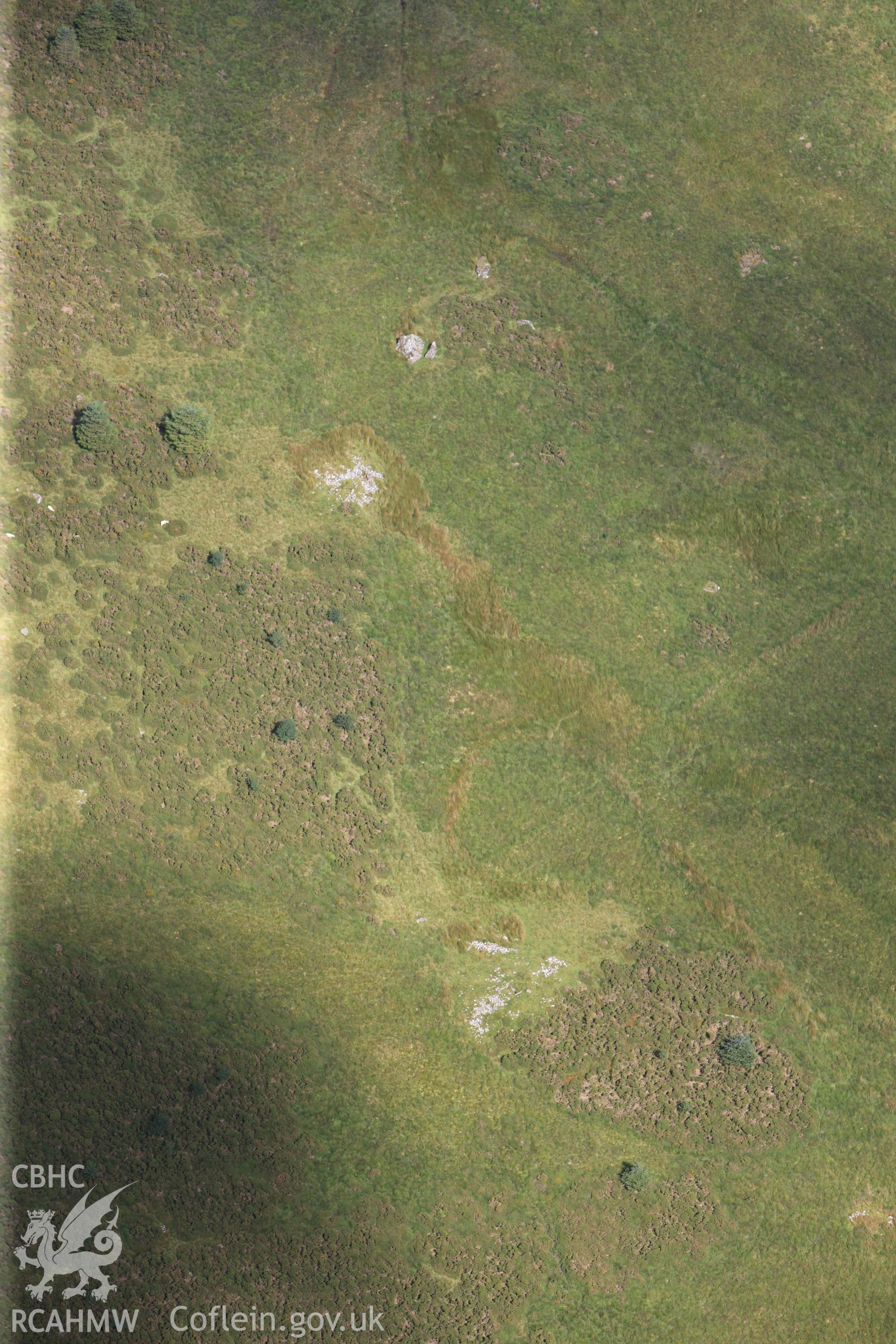 RCAHMW colour oblique photograph of two cairns, Cefn-glas, viewed from the south-west. Taken by Toby Driver on 10/08/2012.