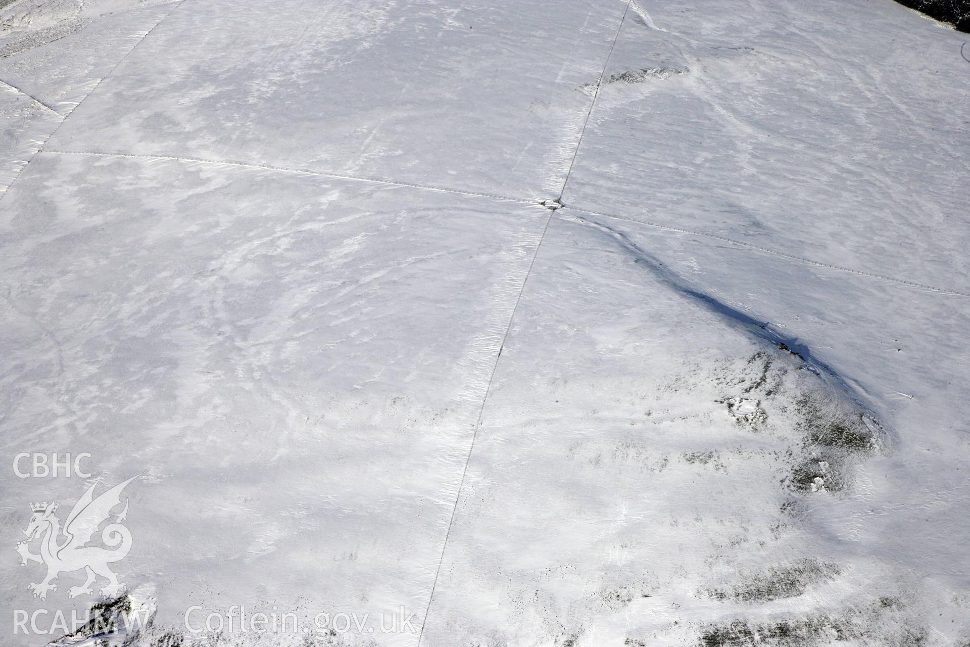 RCAHMW colour oblique photograph of Banc Du Neolithic Enclosure. Taken by Toby Driver on 02/02/2012.