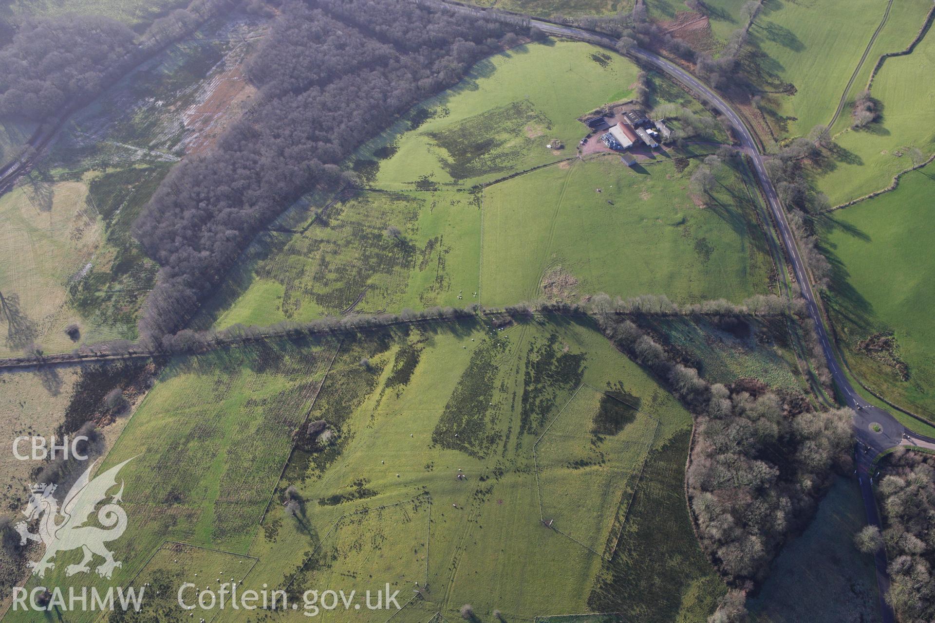 RCAHMW colour oblique photograph of Gorswen, earthworks of deserted farmstead. Taken by Toby Driver on 27/01/2012.