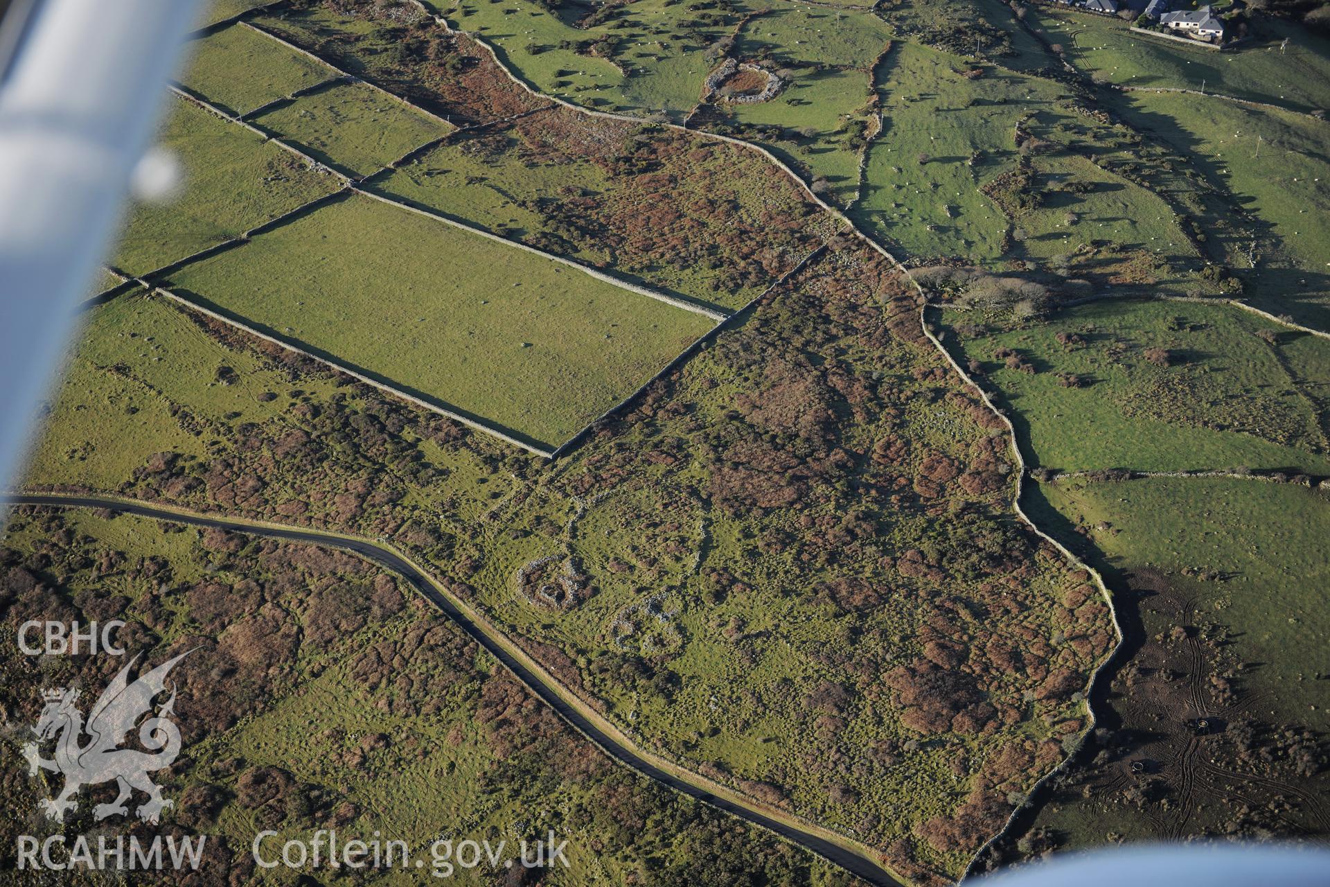 RCAHMW colour oblique photograph of Muriau'r Gwyddelod settlement complex and field system. Taken by Toby Driver on 10/12/2012.