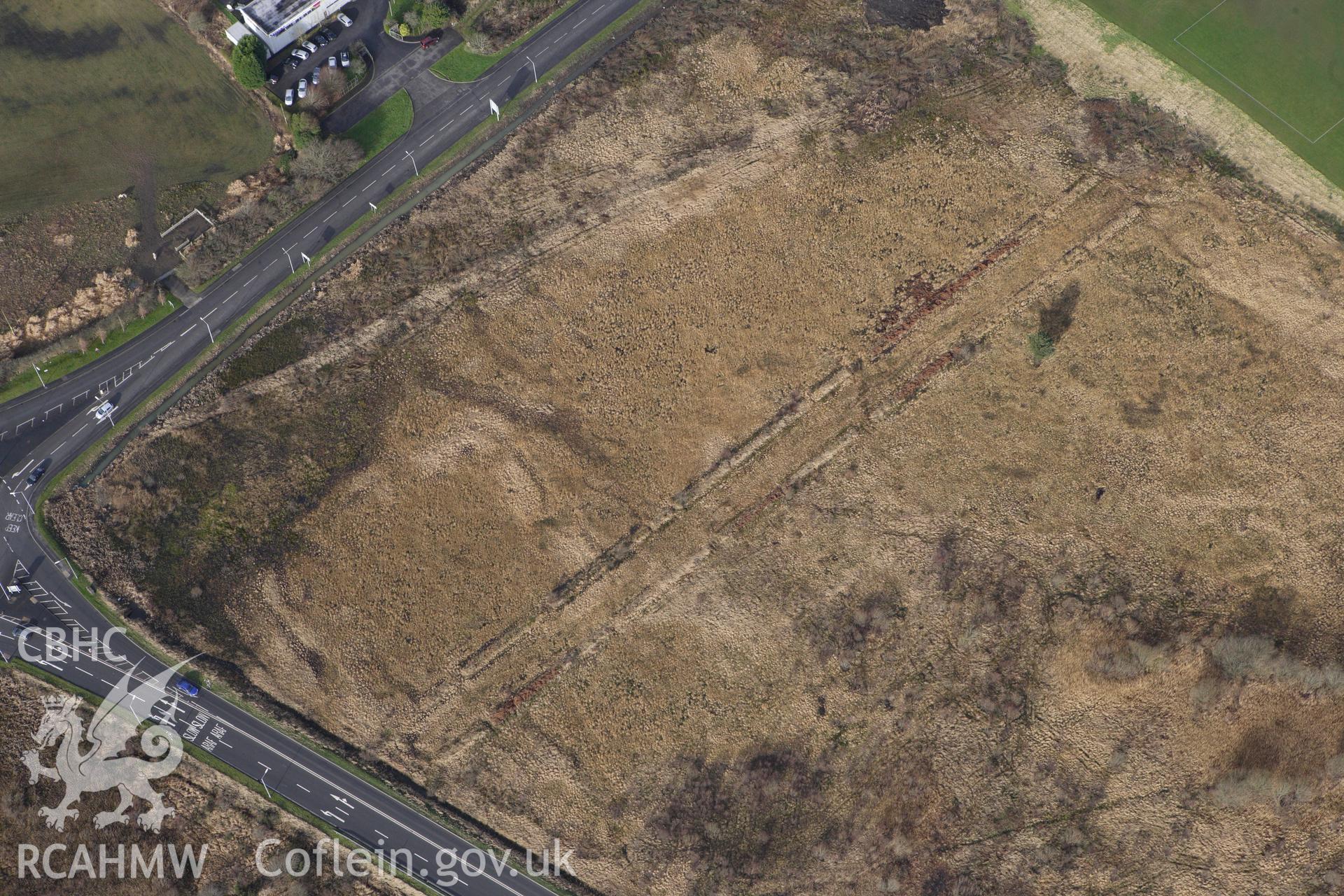 RCAHMW colour oblique photograph of Roman Military Enclosure on Stafford Common. Taken by Toby Driver on 27/01/2012.