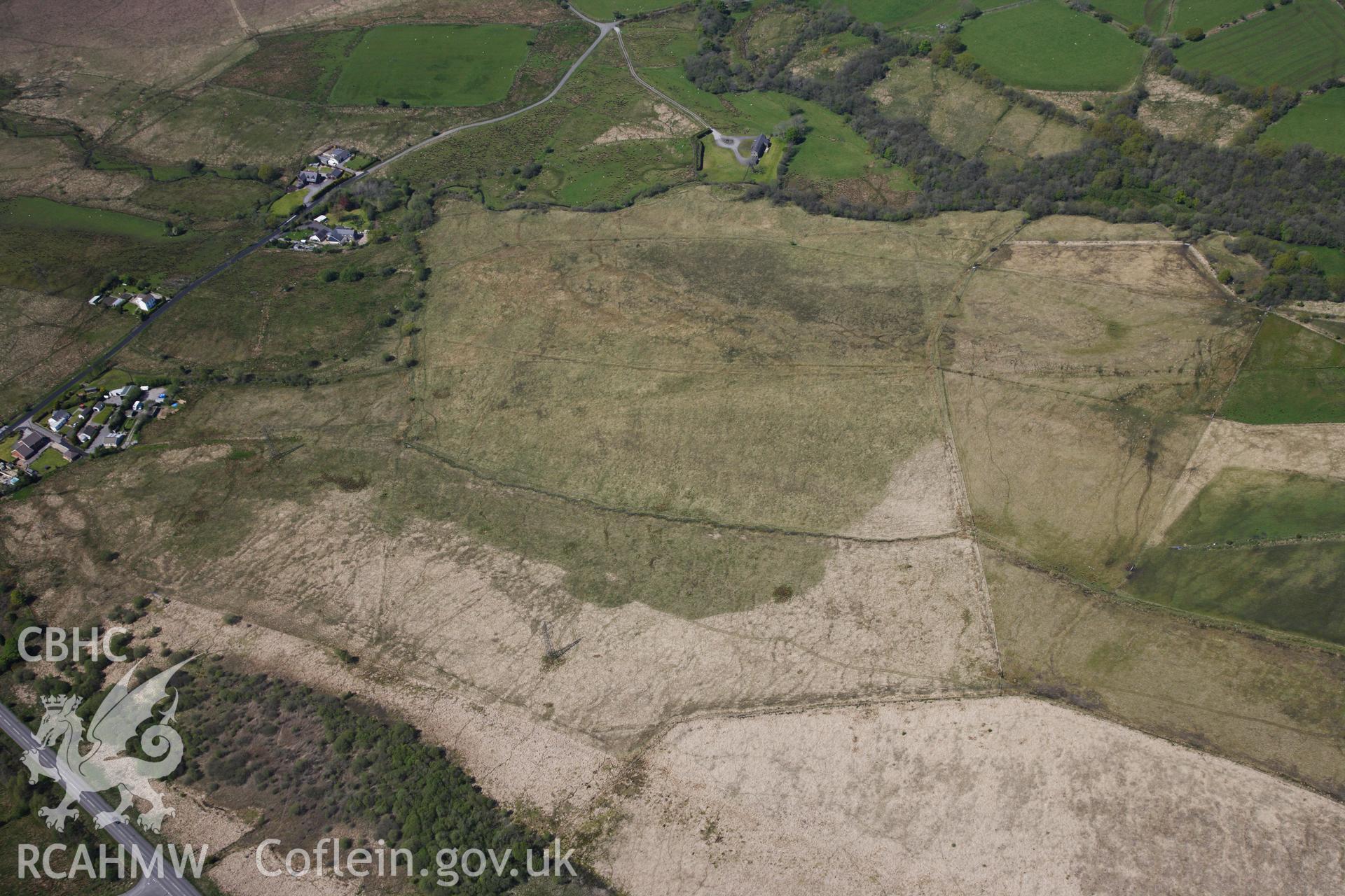 RCAHMW colour oblique photograph of Roman marching camp south-east of Coelbren Roman fort. Taken by Toby Driver on 22/05/2012.