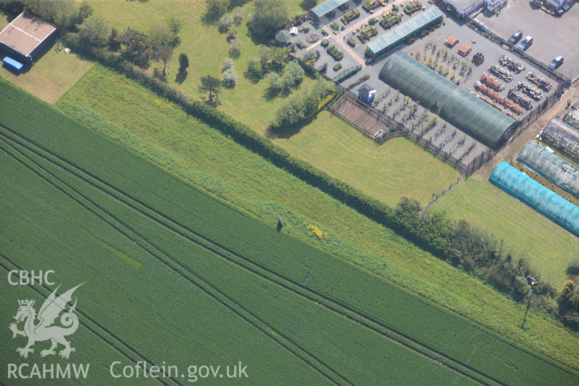 RCAHMW colour oblique photograph of General view of Mabesgate longstone, looking south east. Taken by Toby Driver on 24/05/2012.