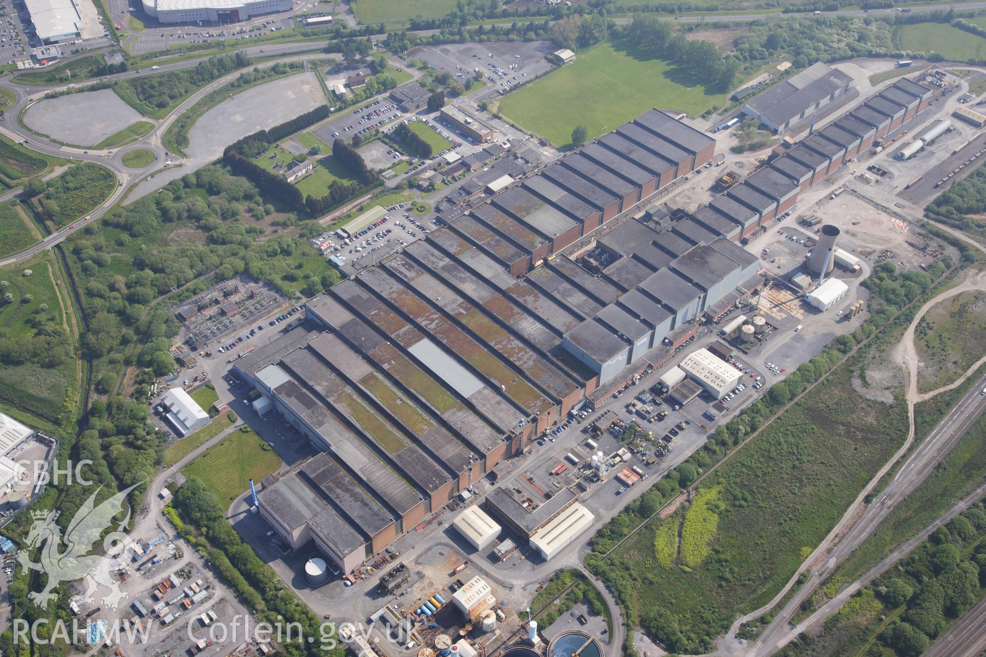 RCAHMW colour oblique photograph of General view of Trostre steel works, looking south east. Taken by Toby Driver on 24/05/2012.