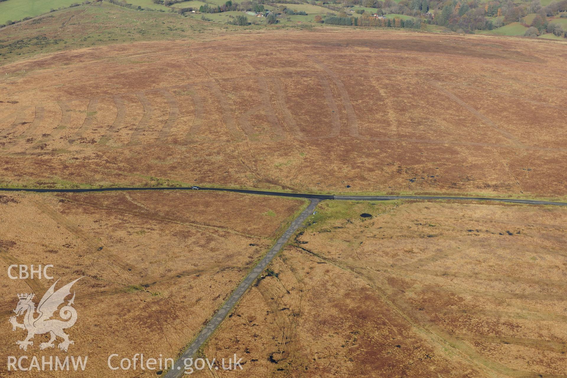 RCAHMW colour oblique photograph of Crug y Biswal, round cairns. Taken by Toby Driver on 05/11/2012.