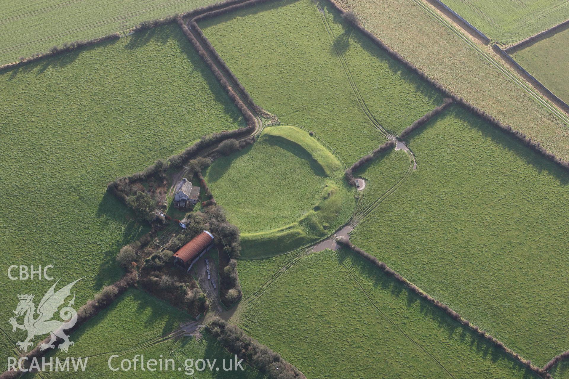 RCAHMW colour oblique photograph of Castell Bryn gwyn, in low winter light. Taken by Toby Driver on 13/01/2012.