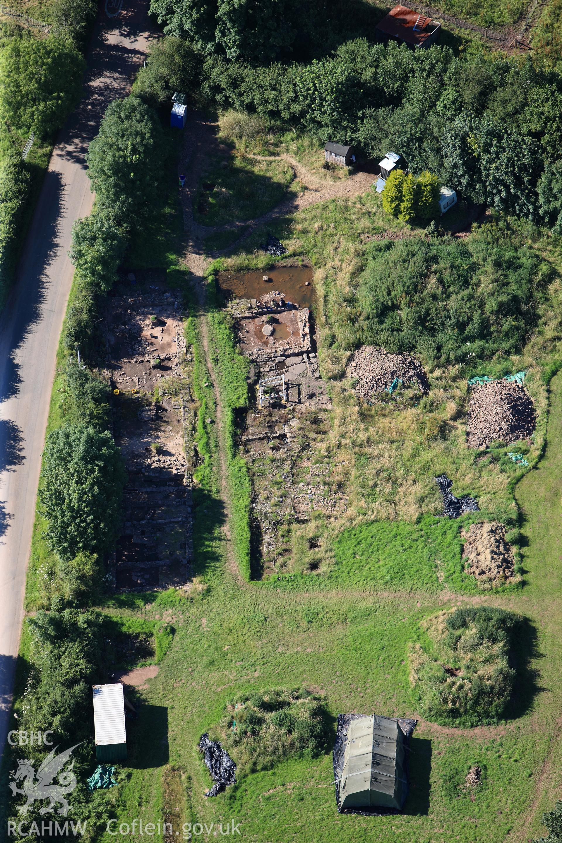 RCAHMW colour oblique photograph of Trellech village earthworks, under excavation. Taken by Toby Driver on 24/07/2012.