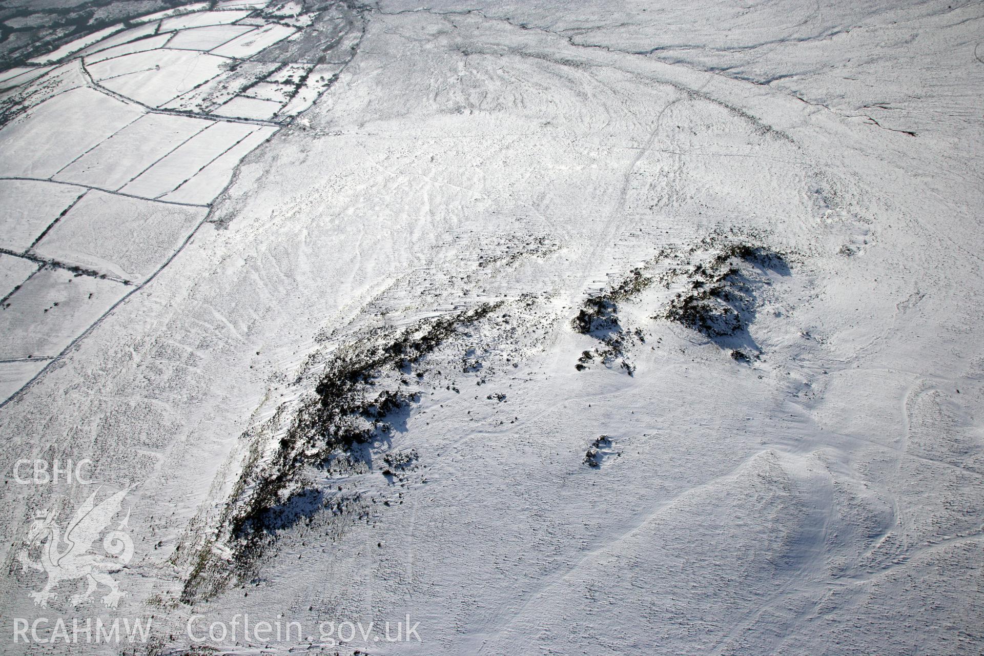 RCAHMW colour oblique photograph of Carn Meini Bluestone Outcrops of Spotted Dolerite. Taken by Toby Driver on 02/02/2012.