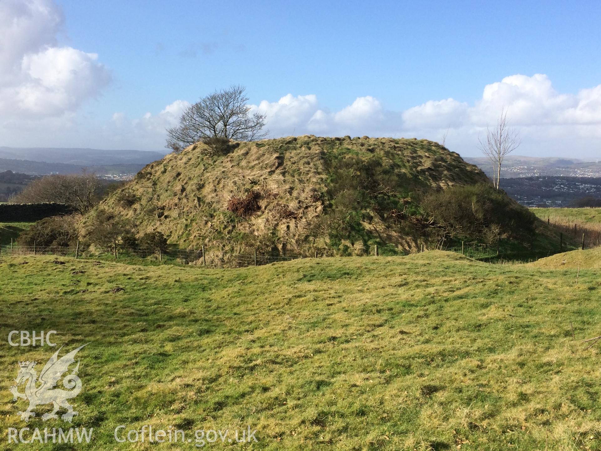 Colour photo showing view of Tywyn Tudur motte, taken by Paul R. Davis, 28th February 2018.