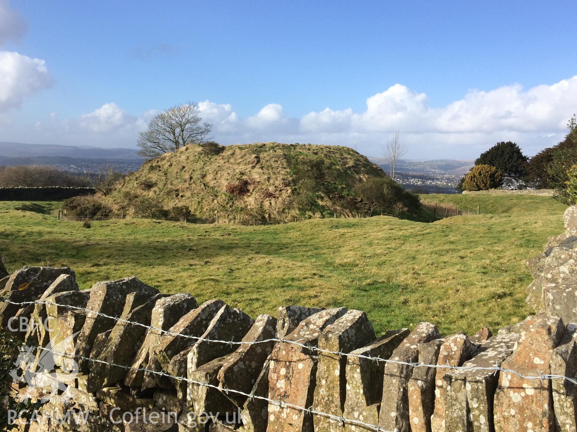 Colour photo showing view of Tywyn Tudur motte, taken by Paul R. Davis, 28th February 2018.