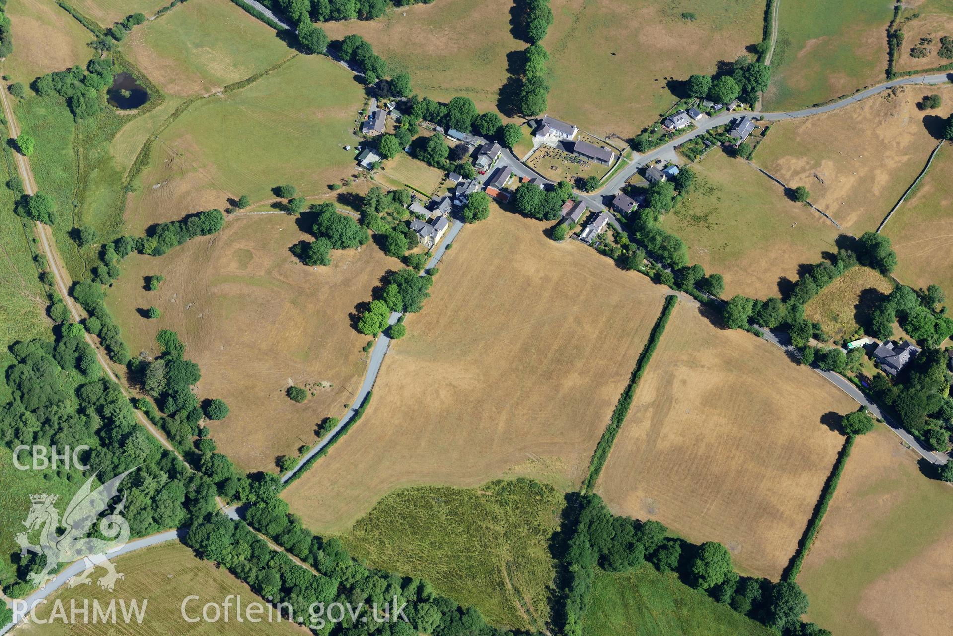 Royal Commission aerial photography of Ystrad Meurig castle and village with extensive parching, taken on 19th July 2018 during the 2018 drought.