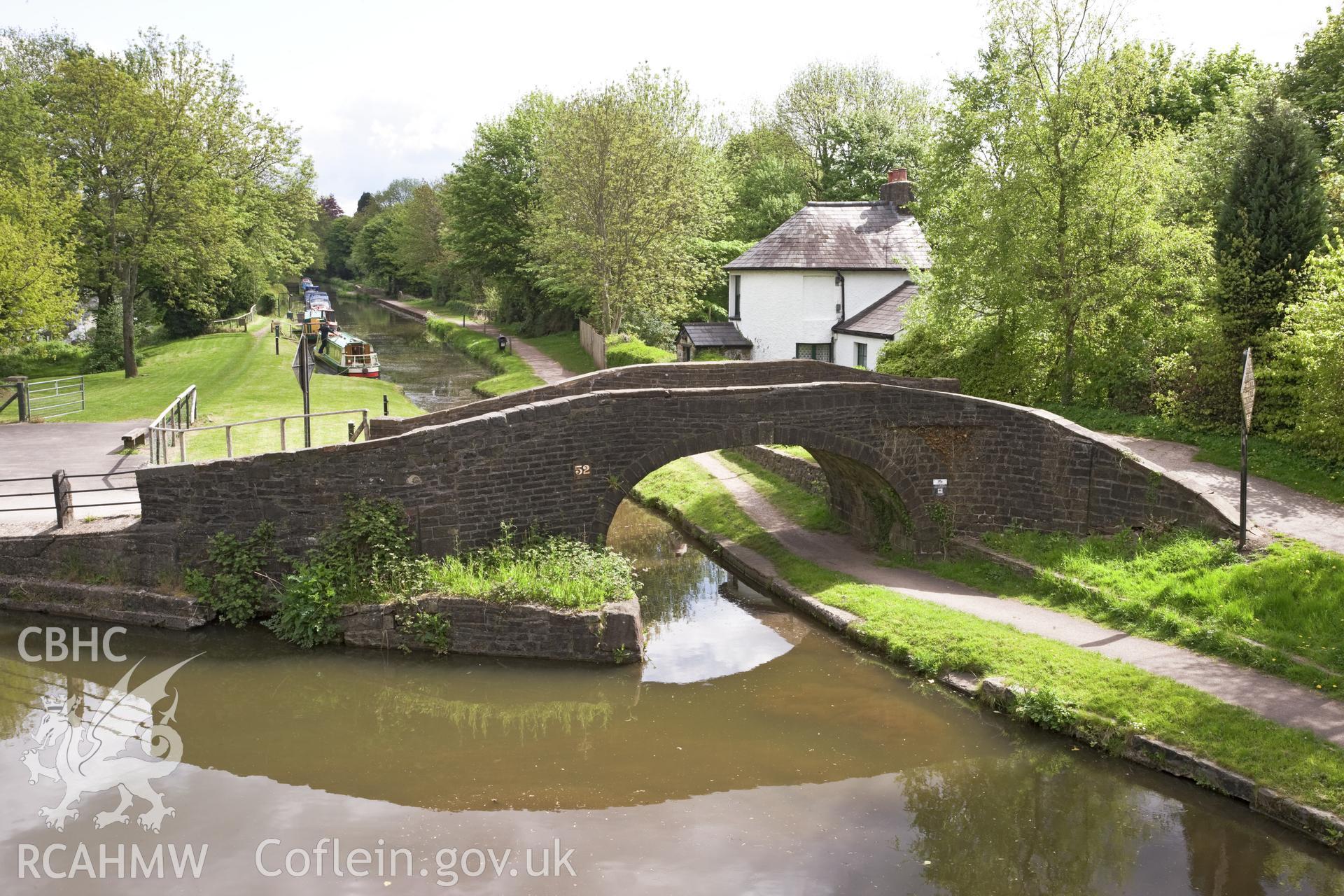 Overbridge (52) and toll-house from the southwest.