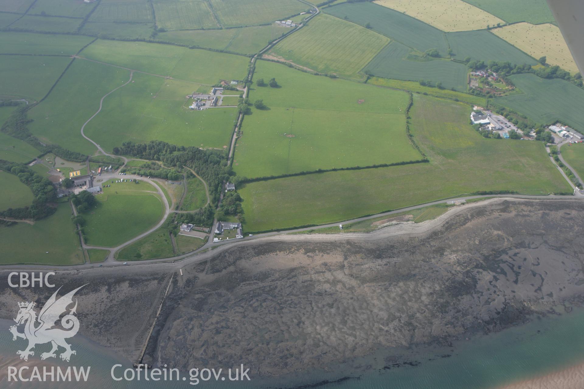 RCAHMW colour oblique photograph of Taicochion, Roman settlement, fields and foreshore near. Taken by Toby Driver on 10/06/2010.