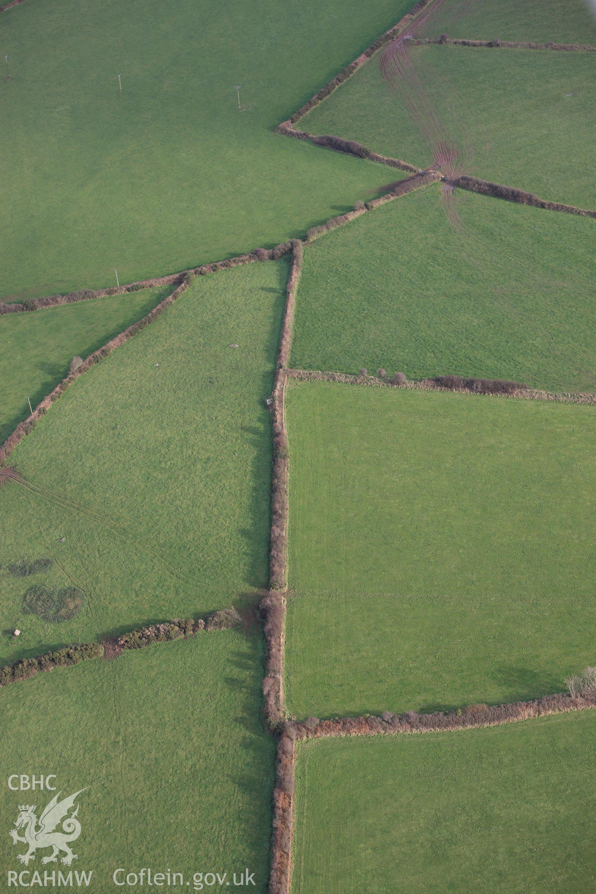 RCAHMW colour oblique photograph of Tre Wallter Llwyd Burial Chamber. Taken by Toby Driver on 16/11/2010.