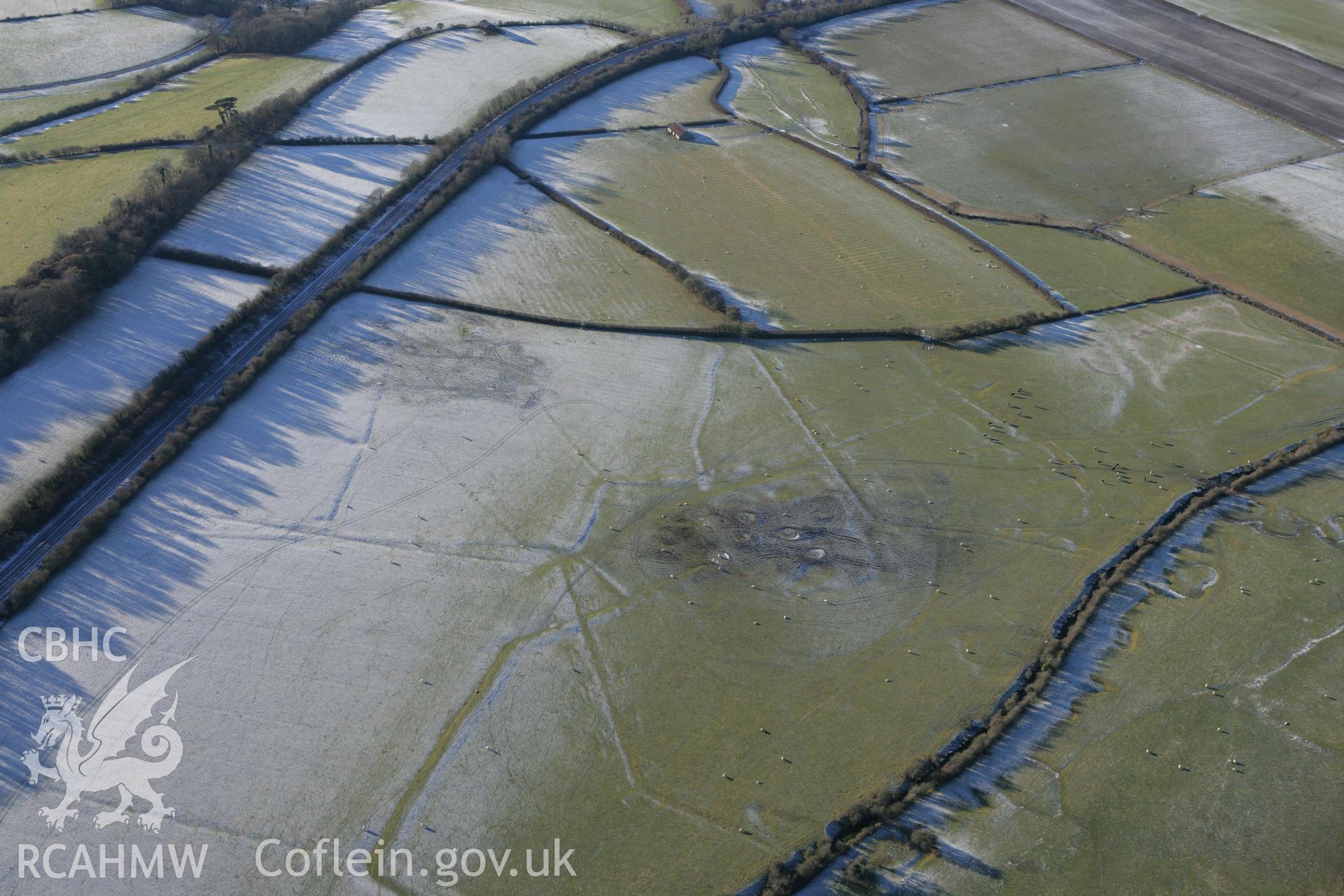 RCAHMW colour oblique photograph of Clemenston, showing earthworks of former field boundaries. Taken by Toby Driver on 08/12/2010.