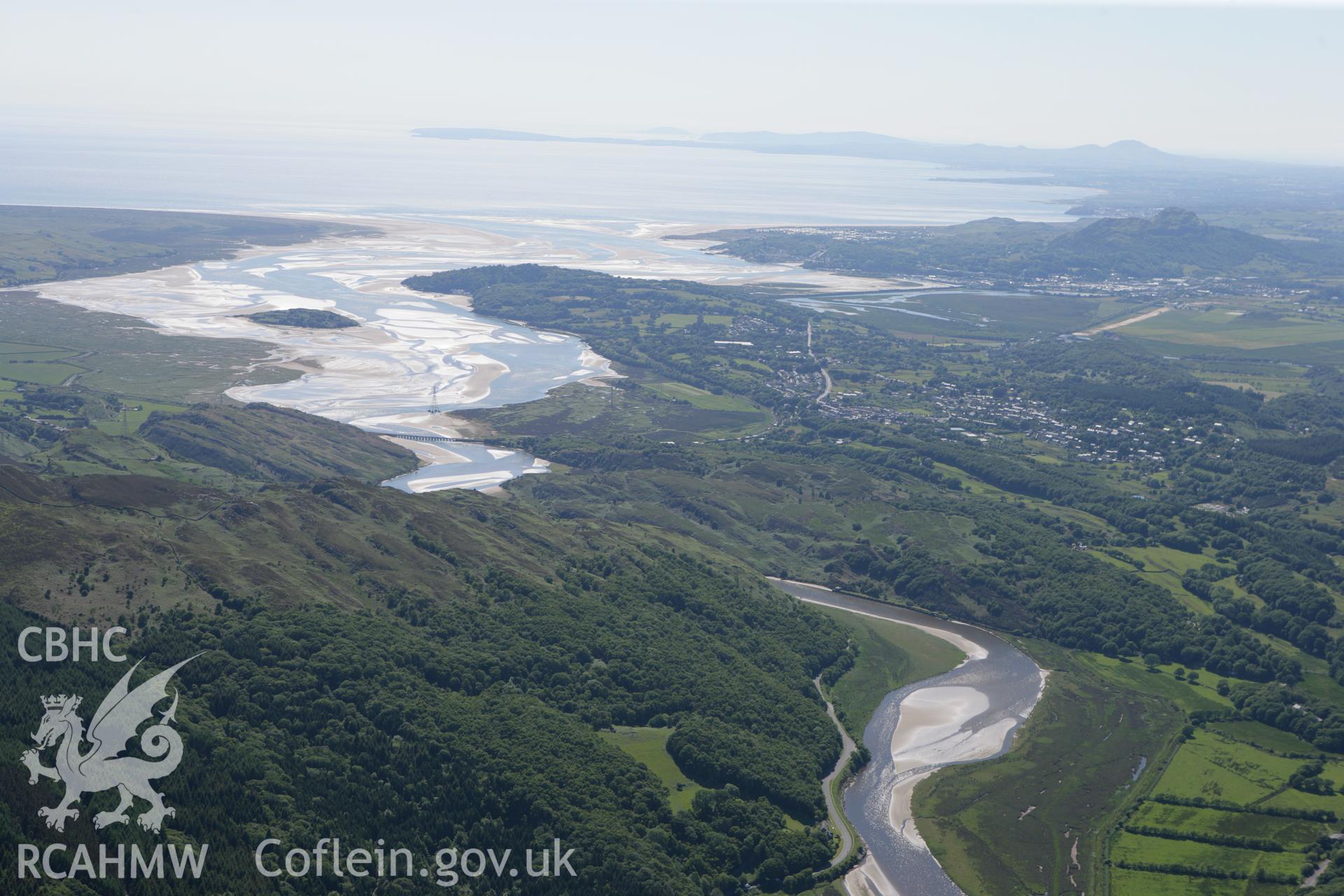 RCAHMW colour oblique photograph of Pont Brivet (Traeth Bach Railway Viaduct), with landscape over Tremadog Bay. Taken by Toby Driver on 16/06/2010.