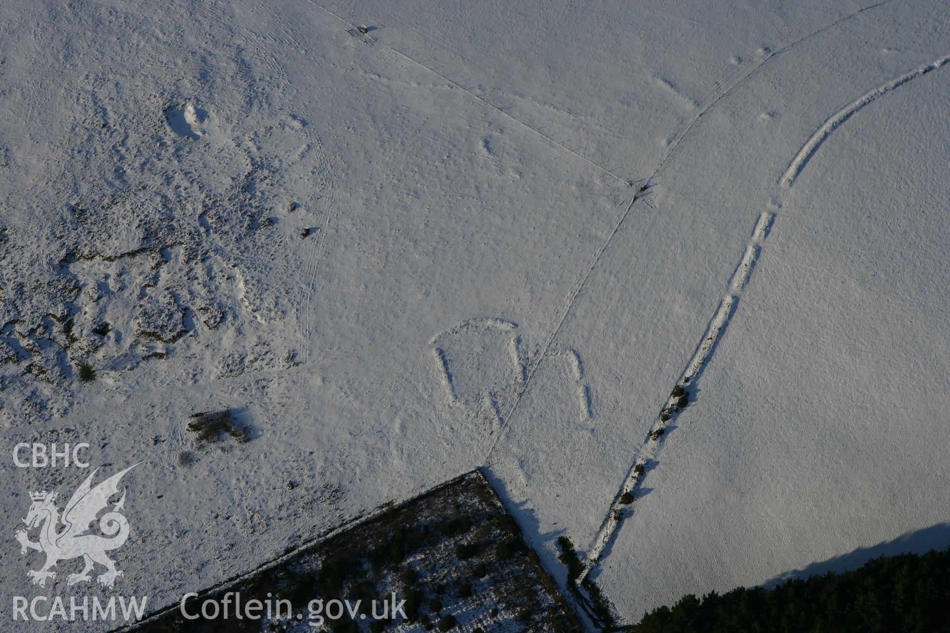 RCAHMW colour oblique photograph of Bernard's Well Mountain, prehistoric settlement. Taken by Toby Driver on 01/12/2010.