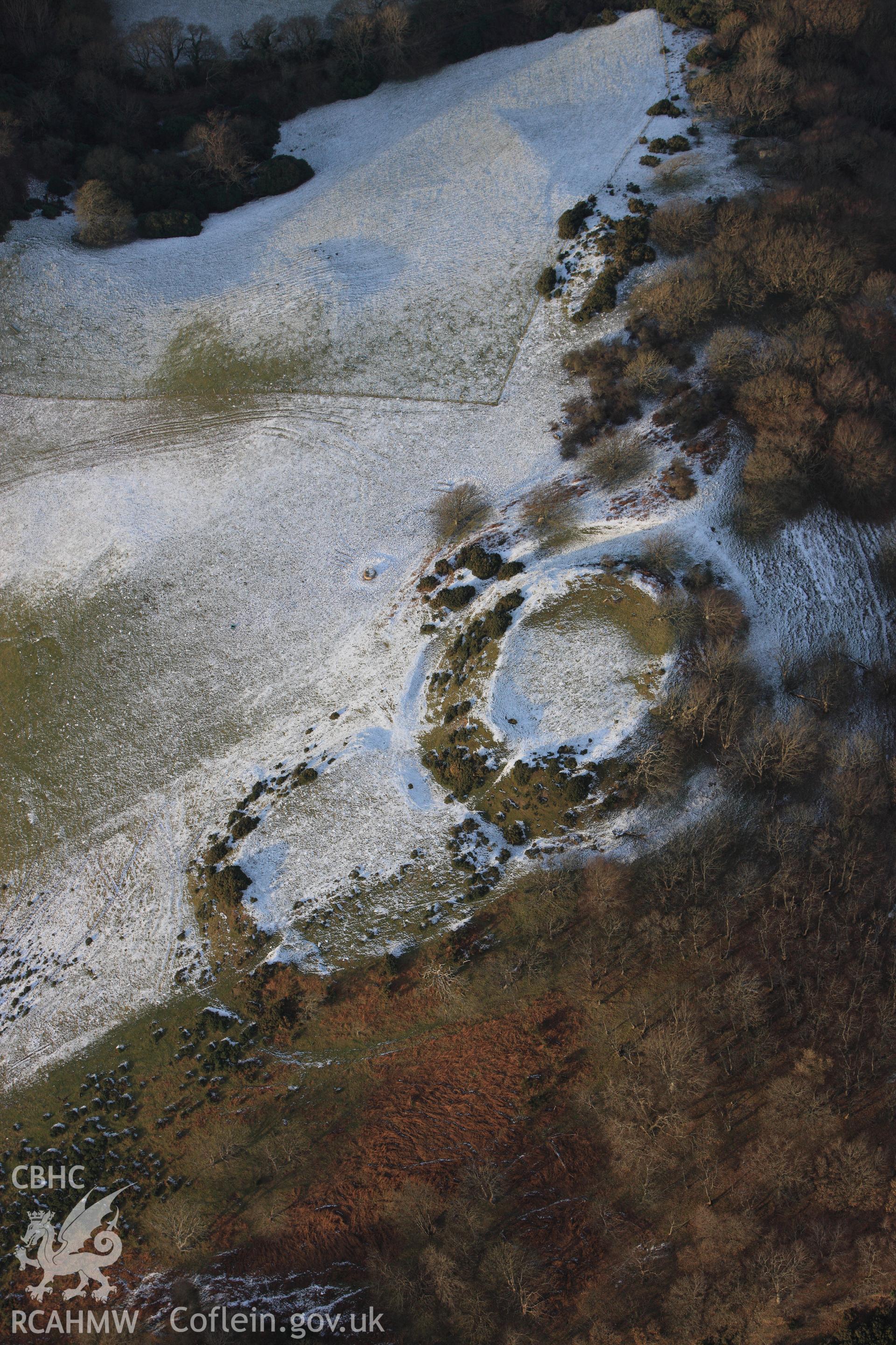 RCAHMW colour oblique photograph of Castell Tan y Castell, with snow. Taken by Toby Driver on 02/12/2010.