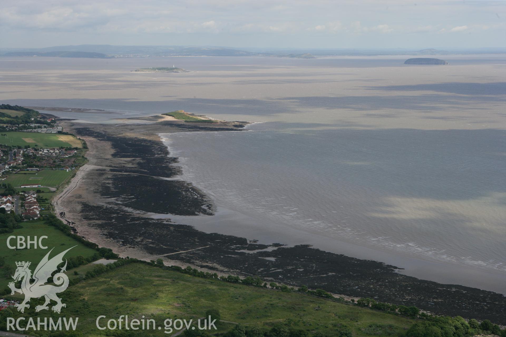 RCAHMW colour oblique photograph of Sully Island, looking south-east towards Flatholm and Steepholm. Taken by Toby Driver on 29/07/2010.