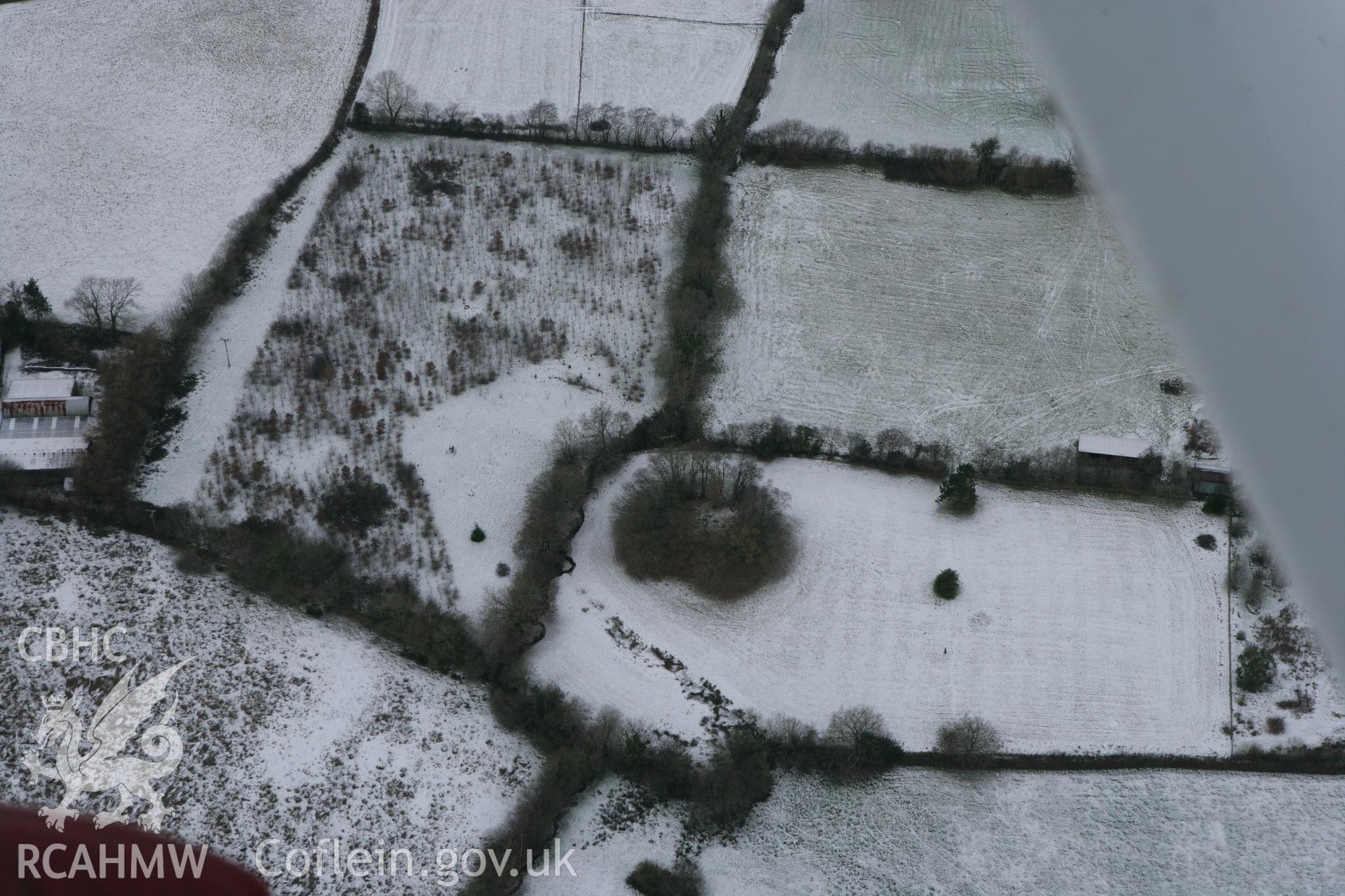 RCAHMW colour oblique photograph of Castell Nonni (Castell Prysg). Taken by Toby Driver on 02/12/2010.