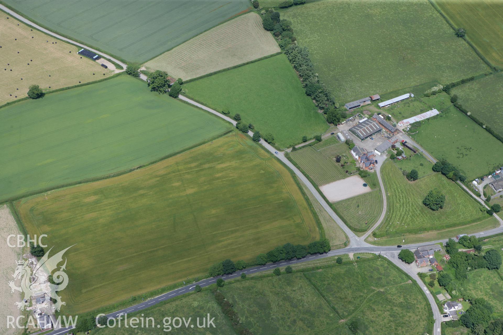 RCAHMW colour oblique photograph of Brompton (Pentrehyling) Roman Fort and Marching Camp. Taken by Toby Driver on 21/06/2010.