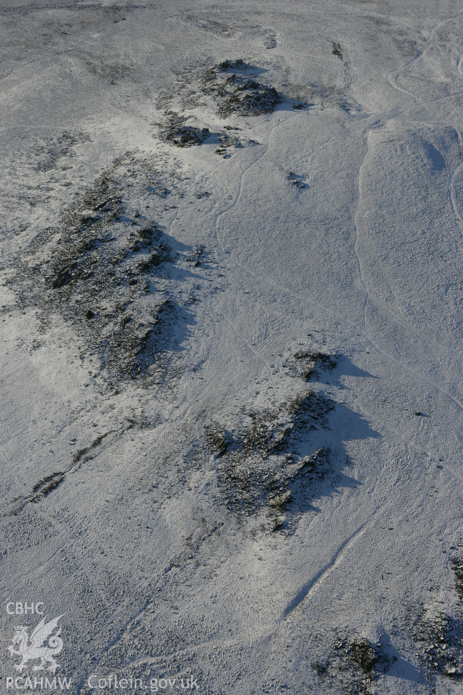 RCAHMW colour oblique photograph of Carn Menyn outcrops. Taken by Toby Driver on 01/12/2010.