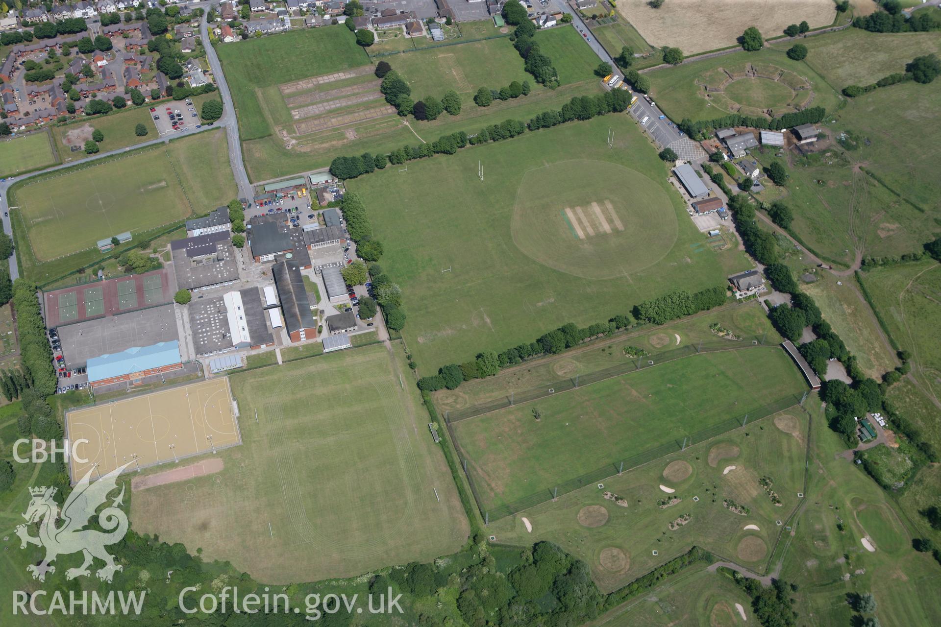 RCAHMW colour oblique photograph of Caerleon Roman Settlement showing the site of the Roman Parade Ground, now under playing fields. Taken by Toby Driver on 21/06/2010.